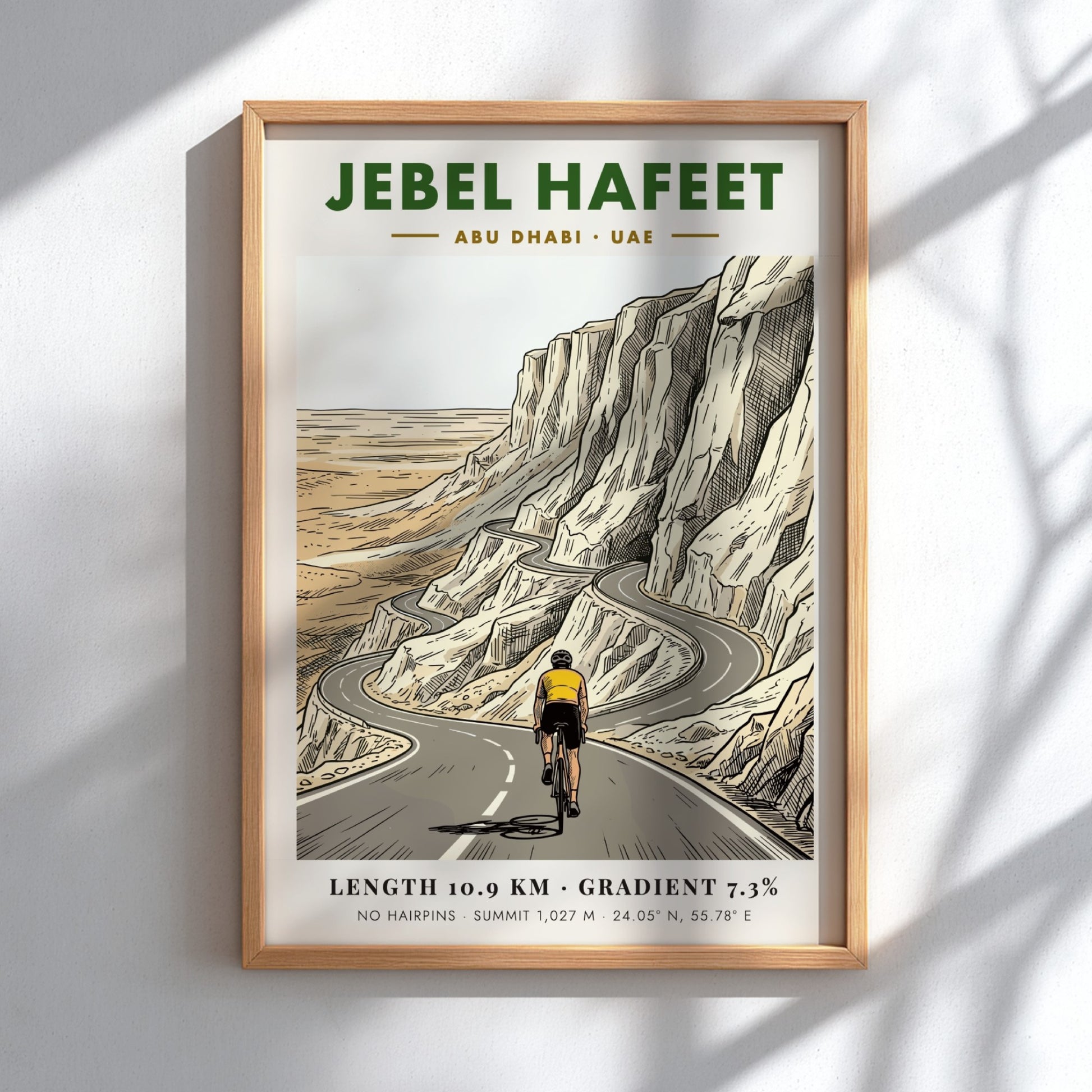 Poster of a cyclist riding up the winding Jebel Hafeet mountain road in Abu Dhabi