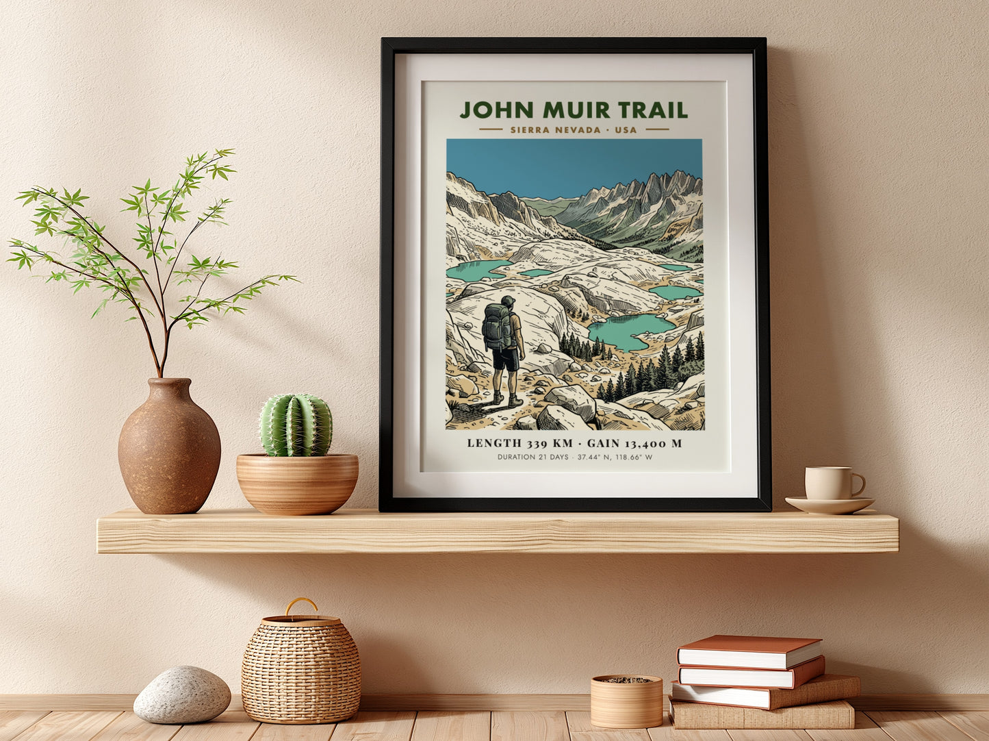 Poster of the John Muir Trail showing a hiker looking at alpine lakes.