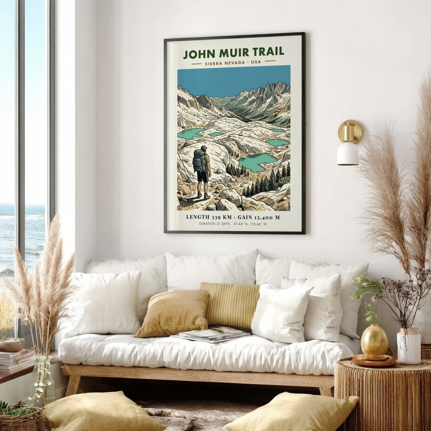 Poster of the John Muir Trail showing a hiker looking at alpine lakes.