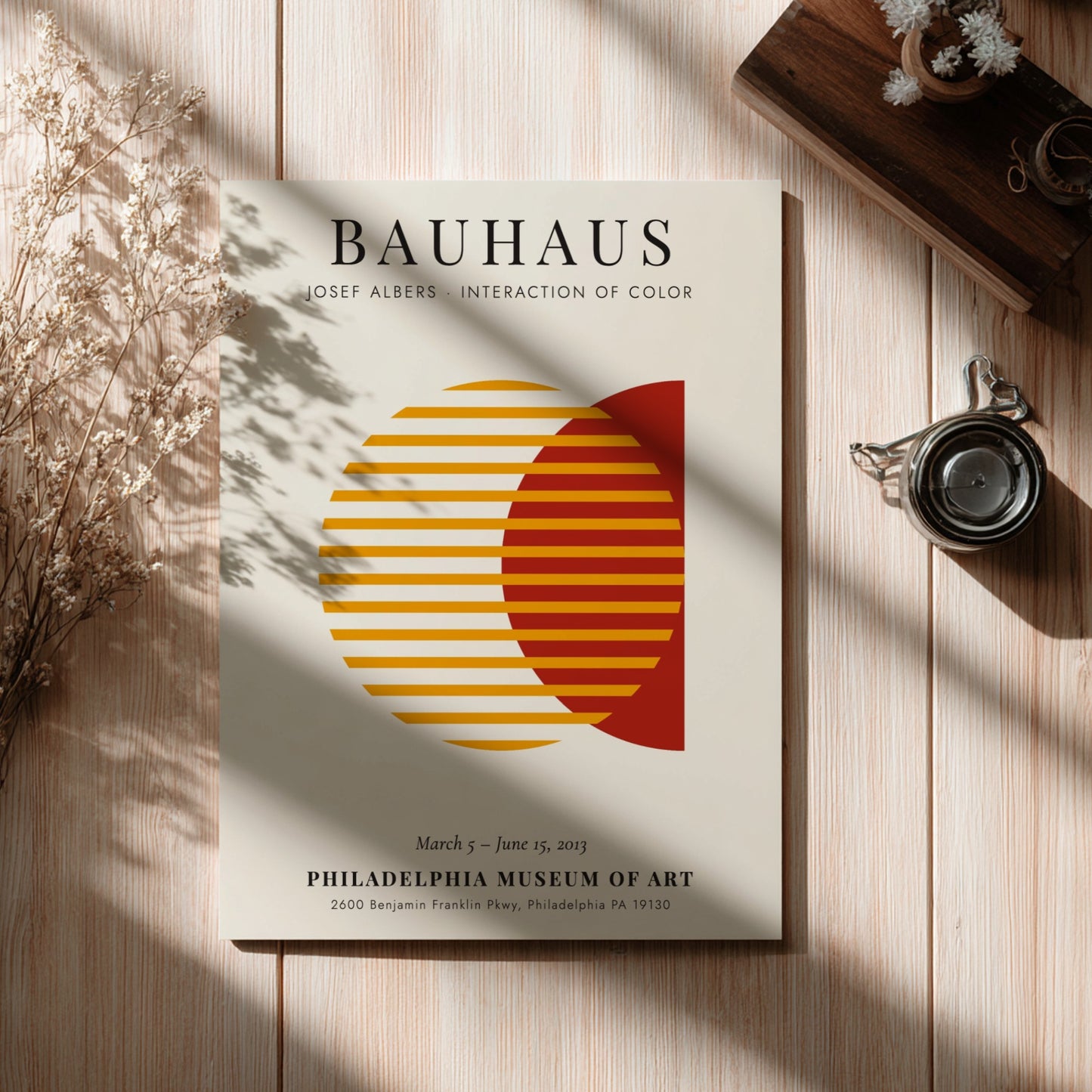 Bauhaus poster featuring Josef Albers' color interaction, geometric design with warm hues and modern style.