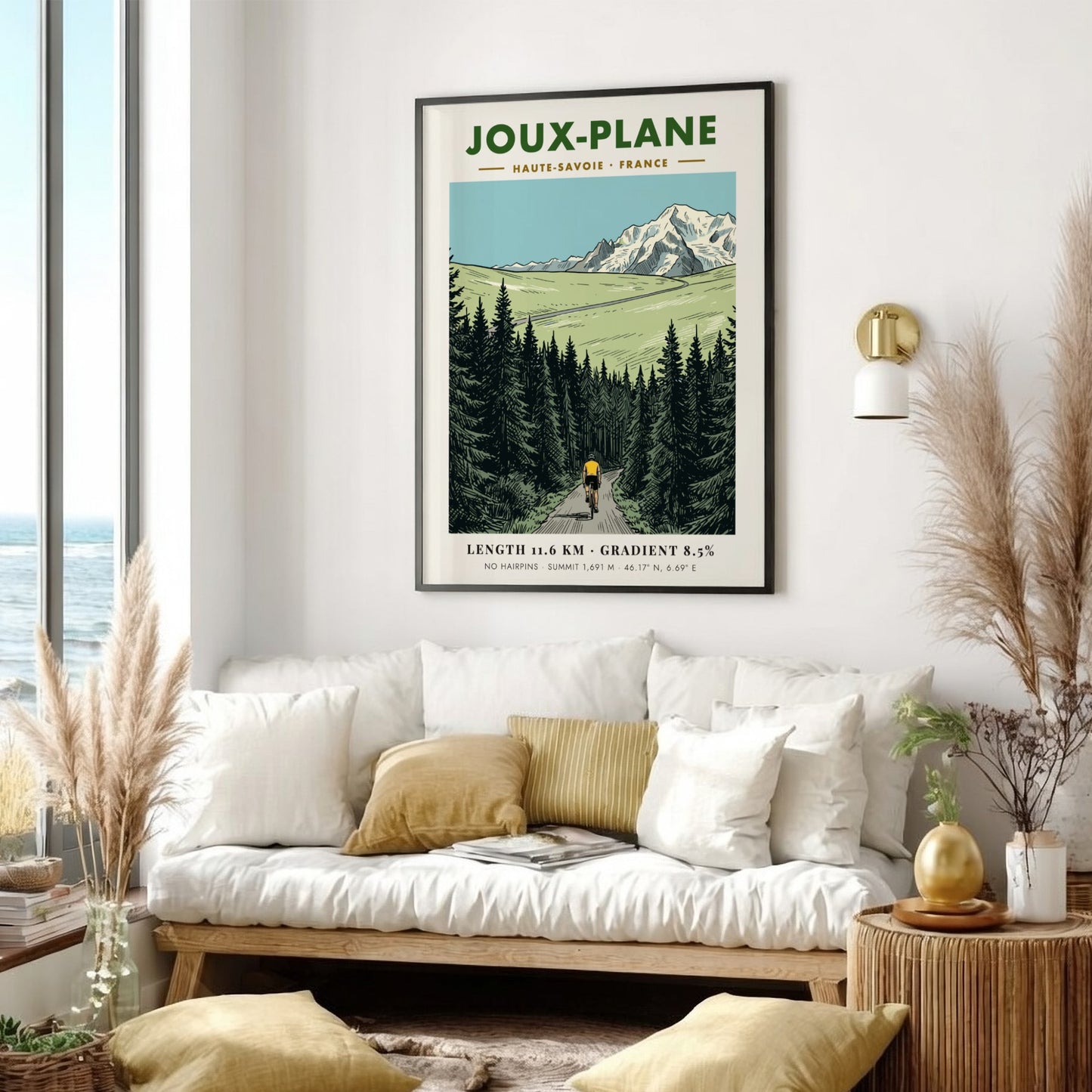 Poster of a cyclist climbing the winding road toward the snowy Joux-Plane mountain.