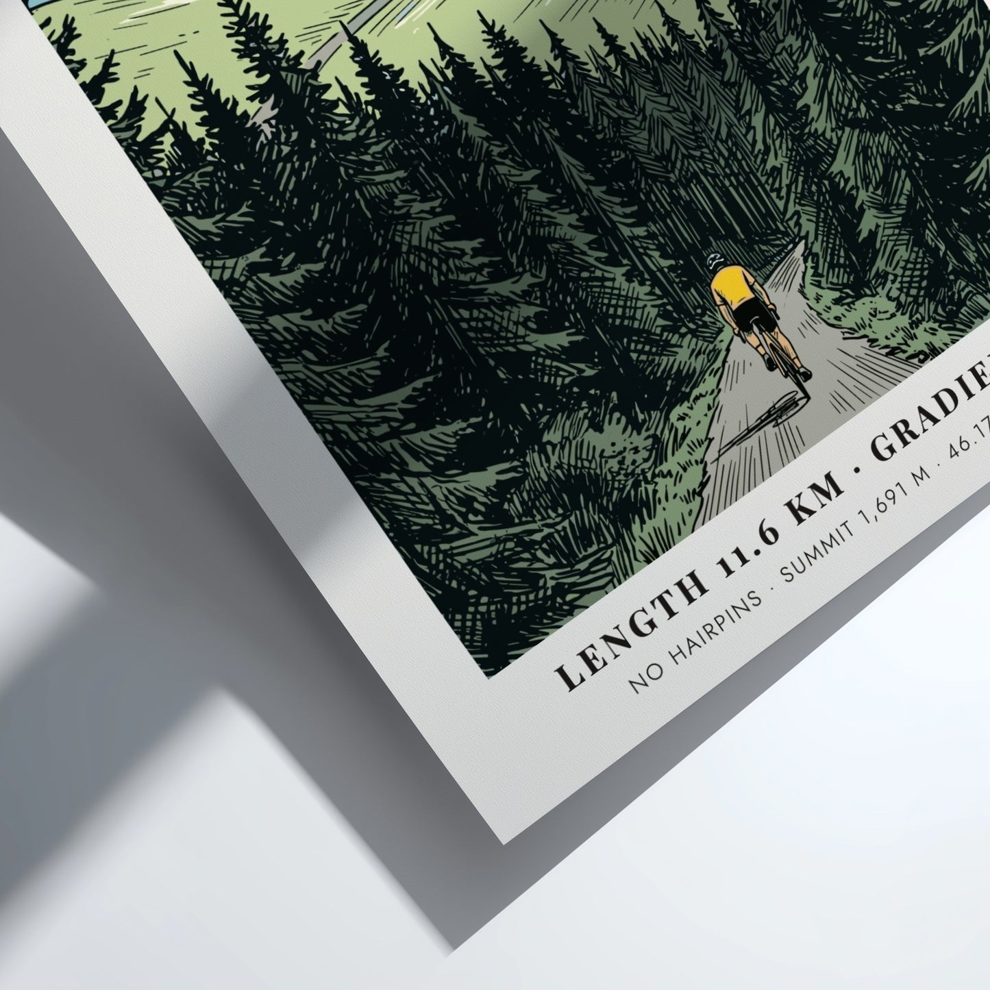 Poster of a cyclist climbing the winding road toward the snowy Joux-Plane mountain.