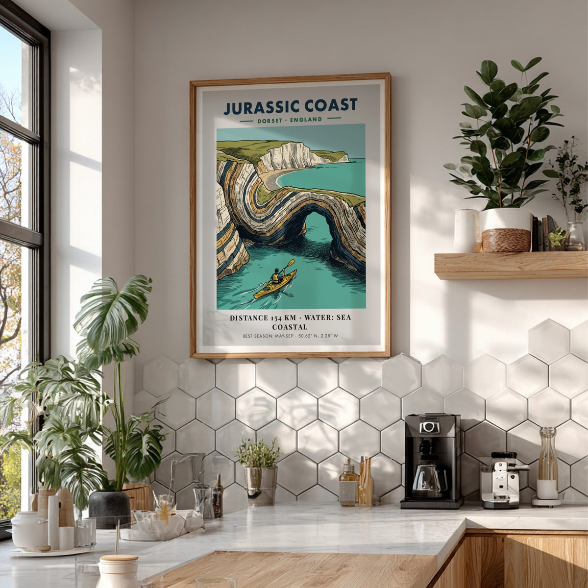 Poster featuring a kayaker paddling through the dramatic limestone arches of the Jurassic Coast.