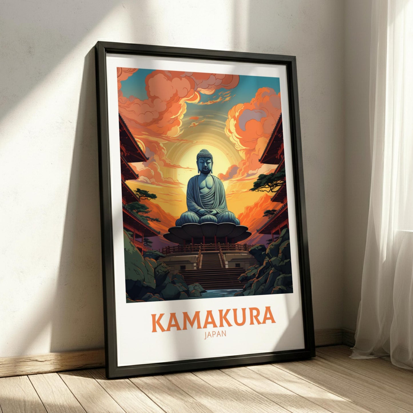 Framed poster of a Buddha statue in Kamakura, Japan, on a wall.
