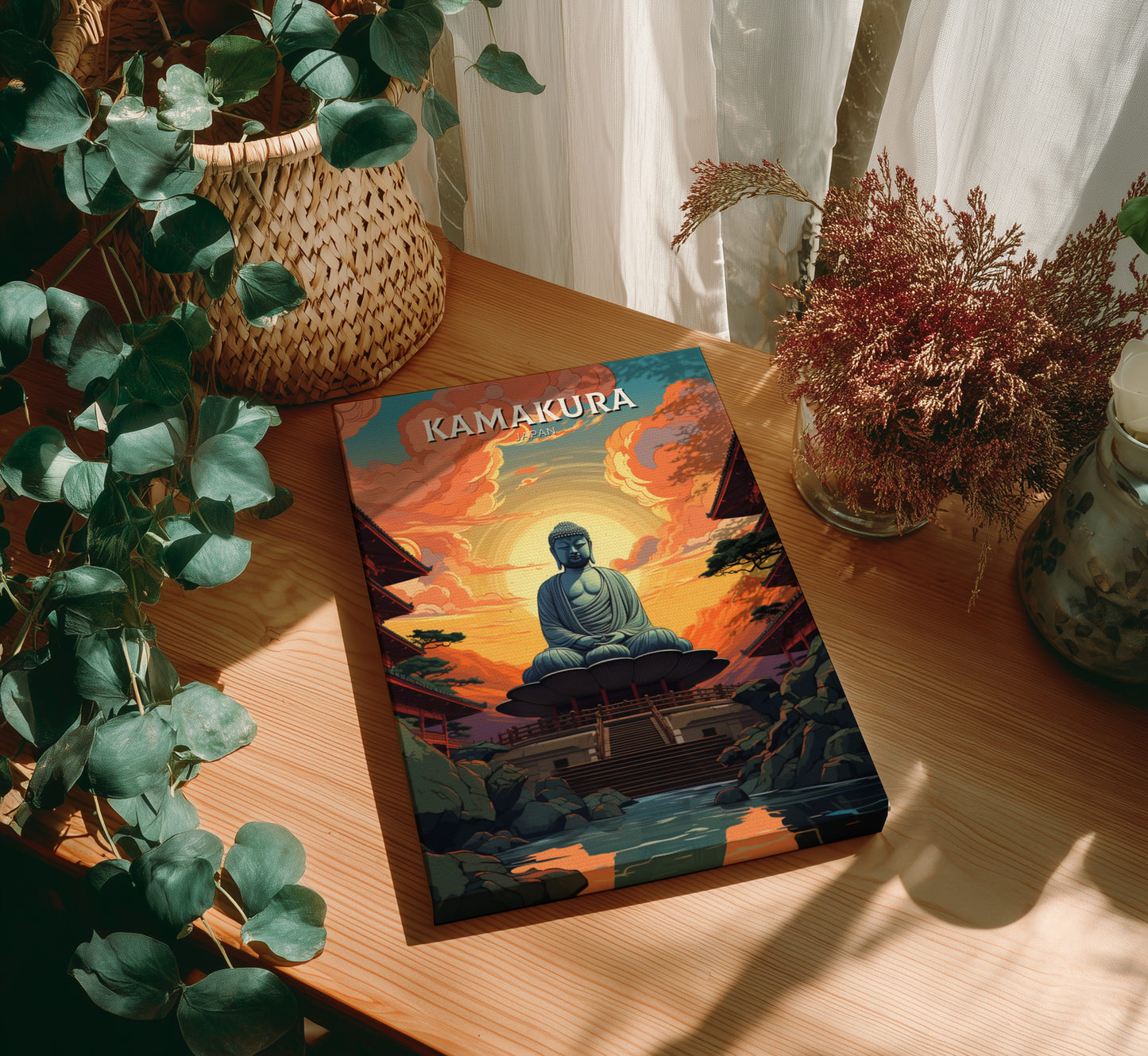 Book titled 'Kamakura' on a wooden table with plants around