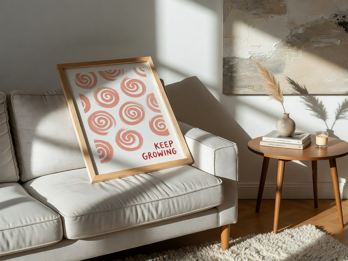 Motivational poster featuring hand-drawn peach spirals on white with Keep Growing red text.