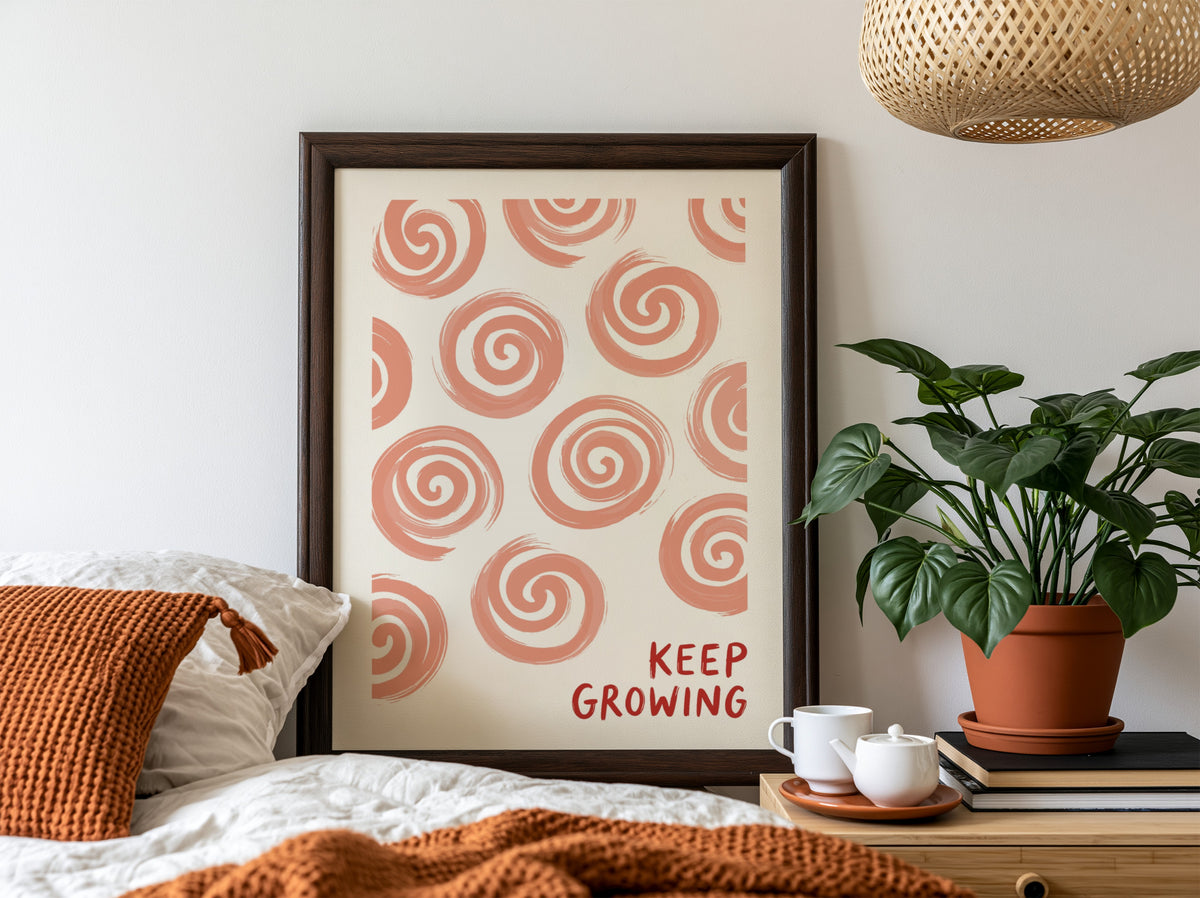 Motivational poster featuring hand-drawn peach spirals on white with Keep Growing red text.
