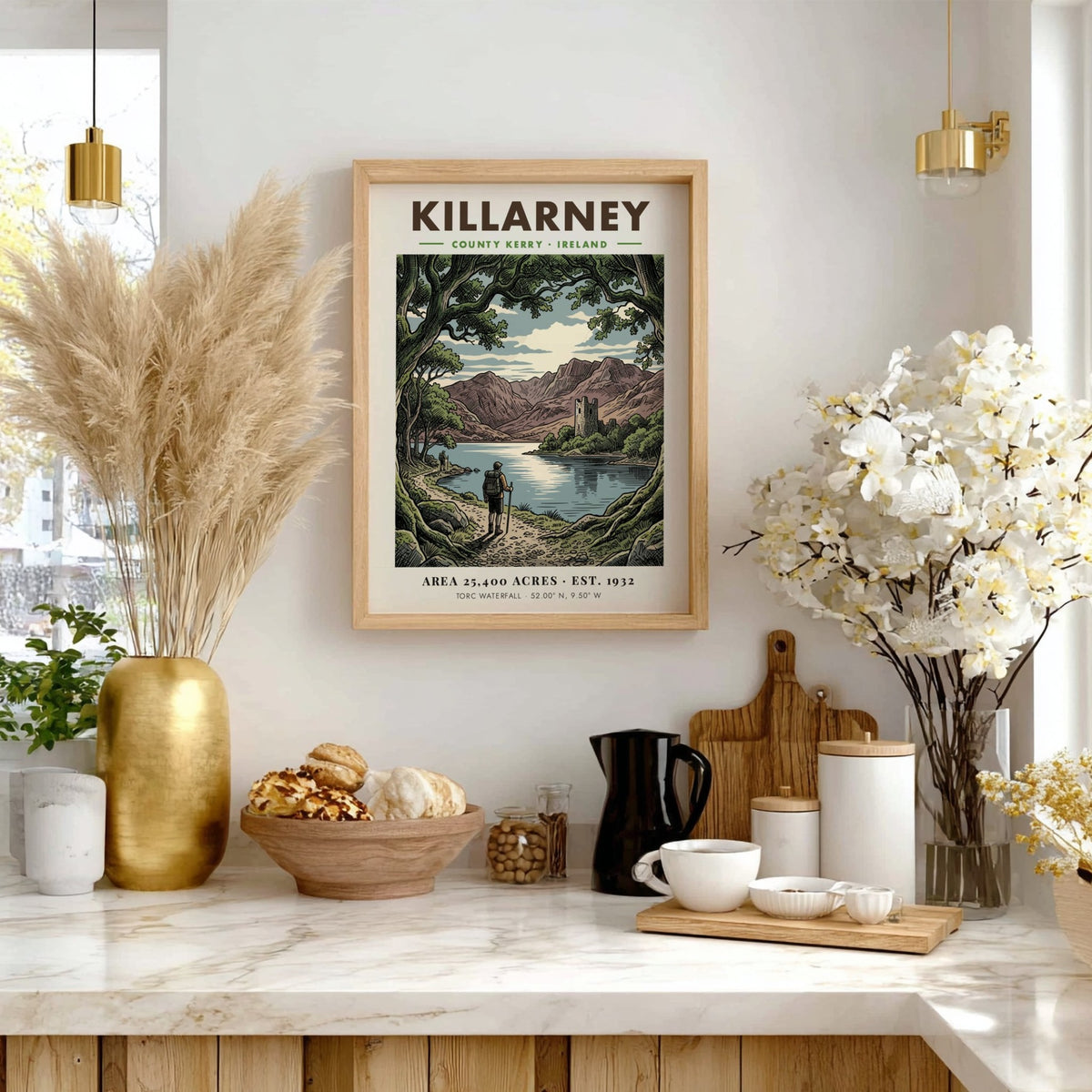 Killarney National Park poster featuring a hiker overlooking a lake and stone tower.