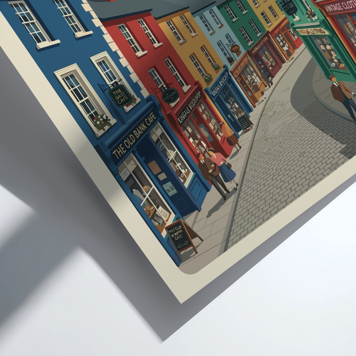 Poster of Kinsale Ireland featuring colourful storefronts and sailboats in a coastal harbour.