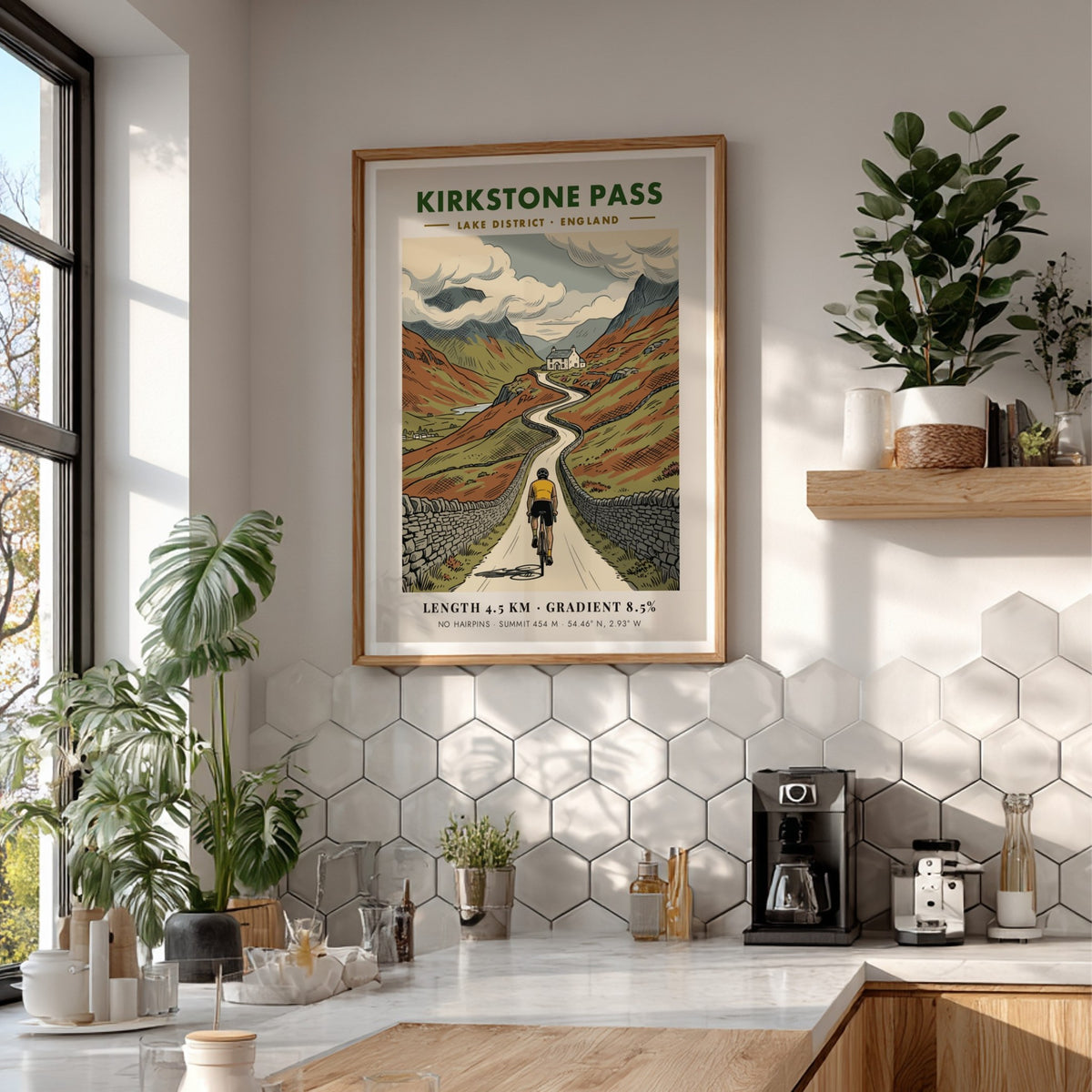 Cycling poster showing a rider on the Kirkstone Pass road in the Lake District.