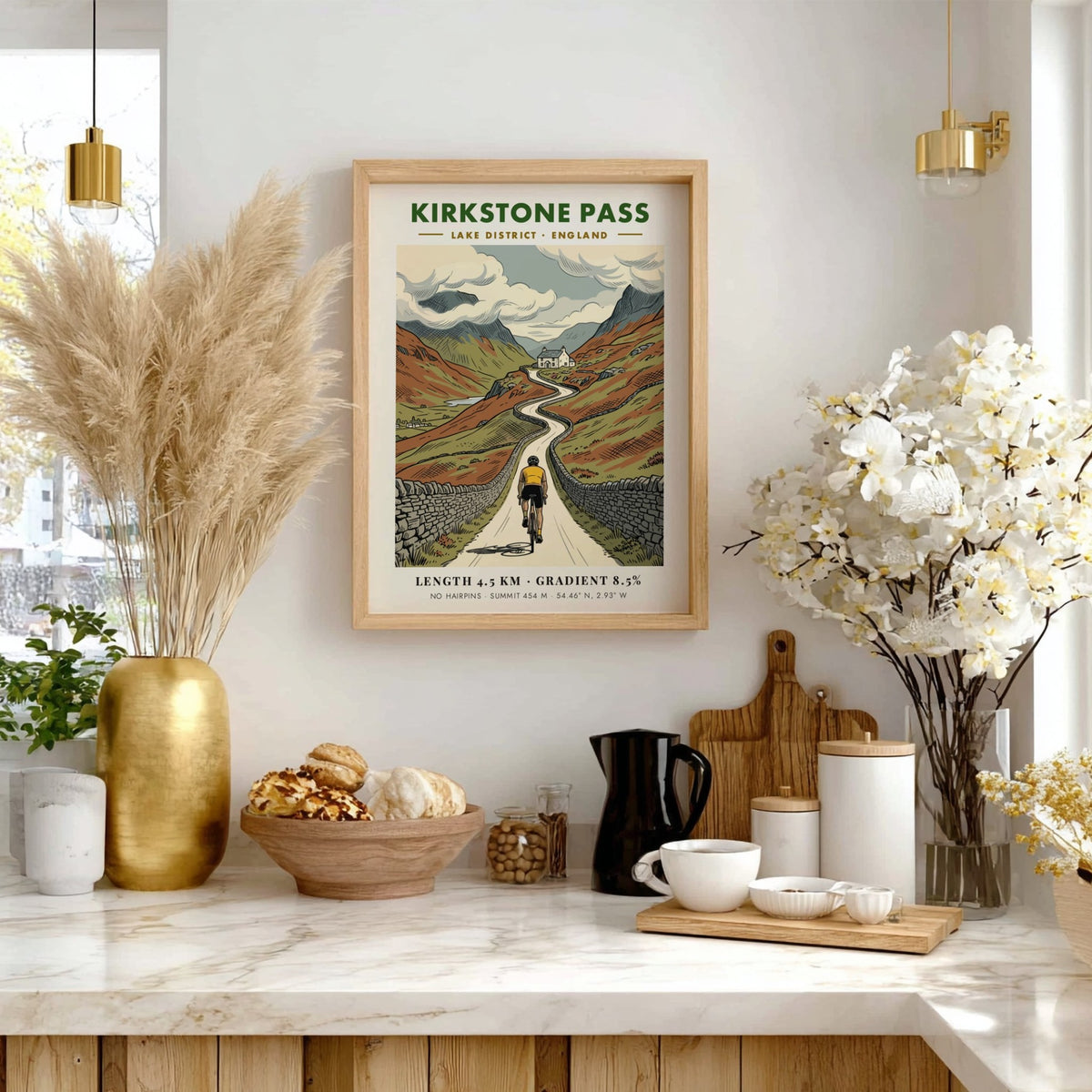 Cycling poster showing a rider on the Kirkstone Pass road in the Lake District.