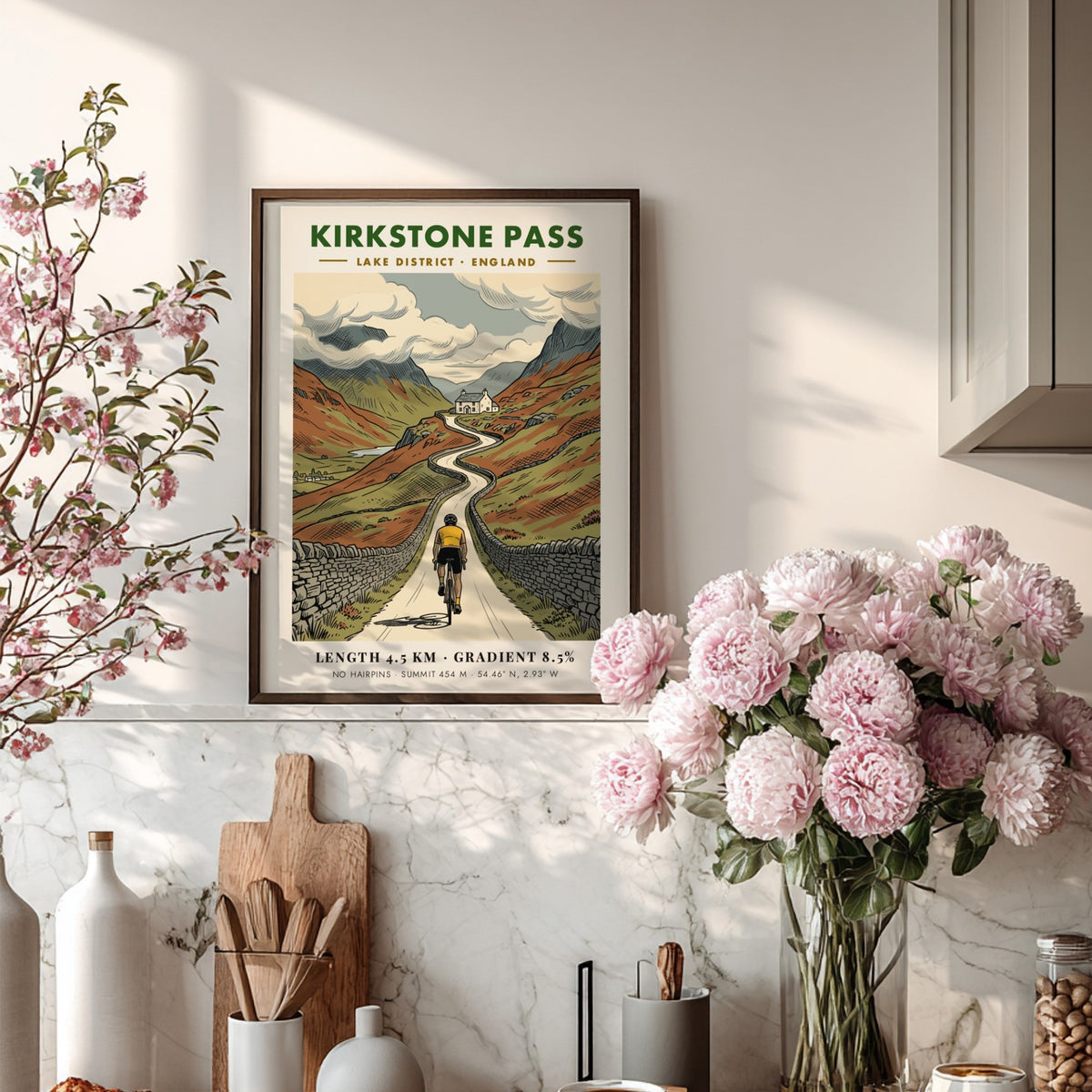 Cycling poster showing a rider on the Kirkstone Pass road in the Lake District.