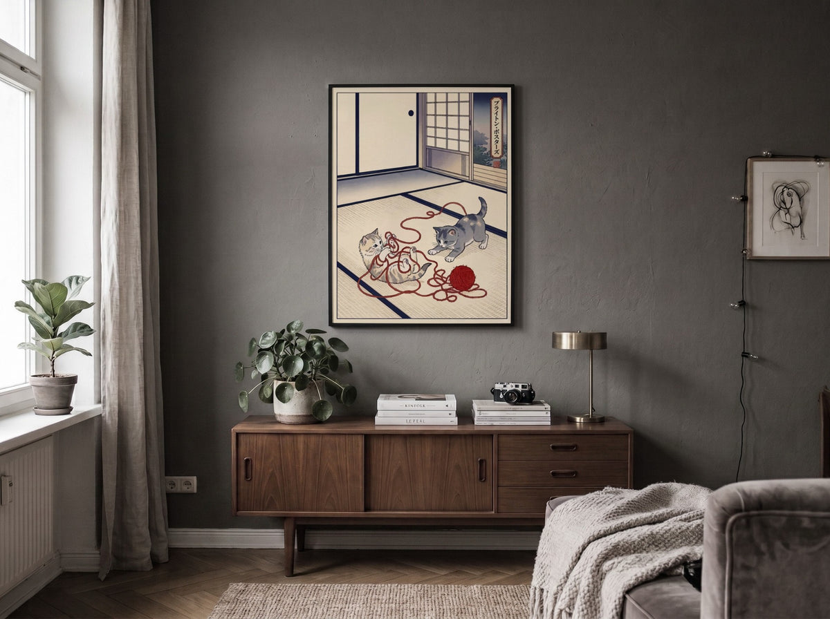 Poster featuring two kittens playing with red yarn in a traditional Japanese room style.