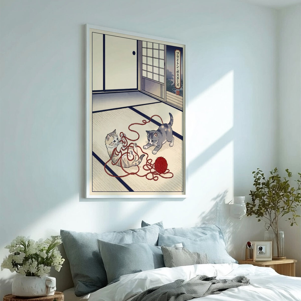 Poster featuring two kittens playing with red yarn in a traditional Japanese room style.