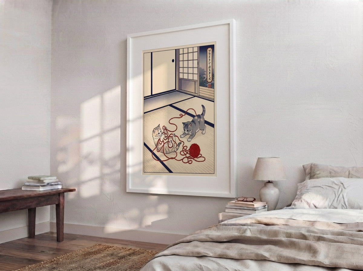 Poster featuring two kittens playing with red yarn in a traditional Japanese room style.