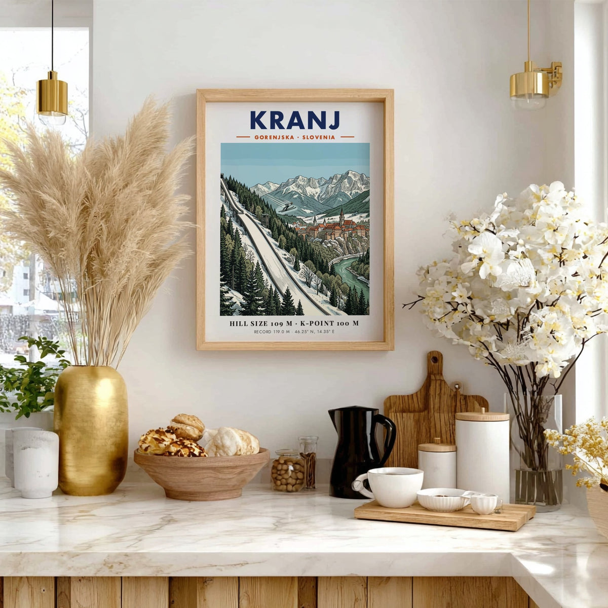 Poster of Kranj Slovenia featuring a ski jumper above a historic town and mountains.