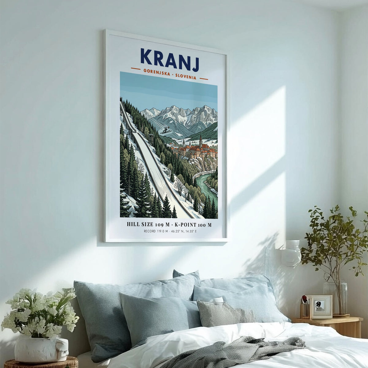 Poster of Kranj Slovenia featuring a ski jumper above a historic town and mountains.