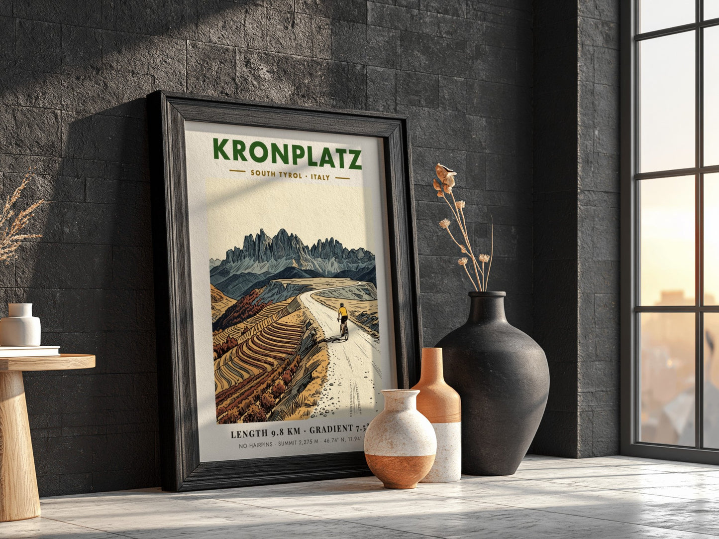 Poster of a cyclist climbing the gravel road to the Kronplatz summit peak.