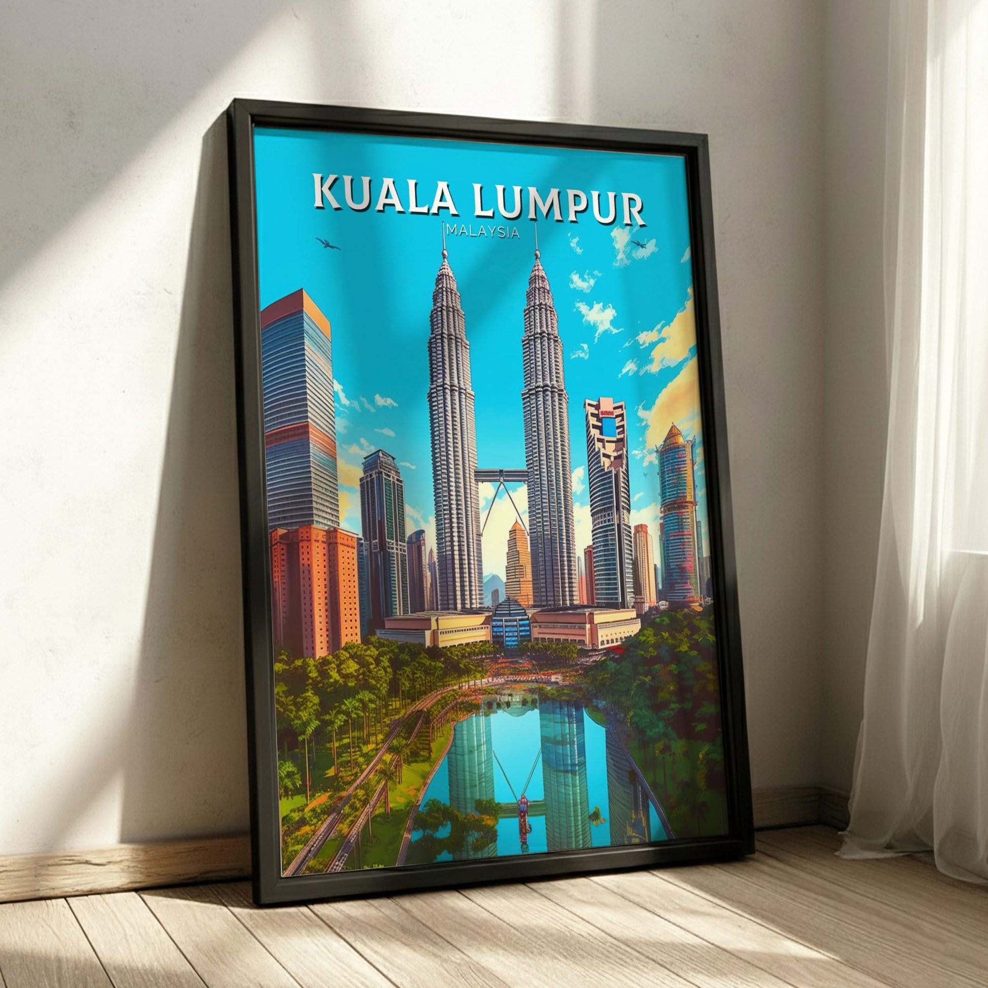 Framed poster of Kuala Lumpur with Petronas Towers on a wooden floor.