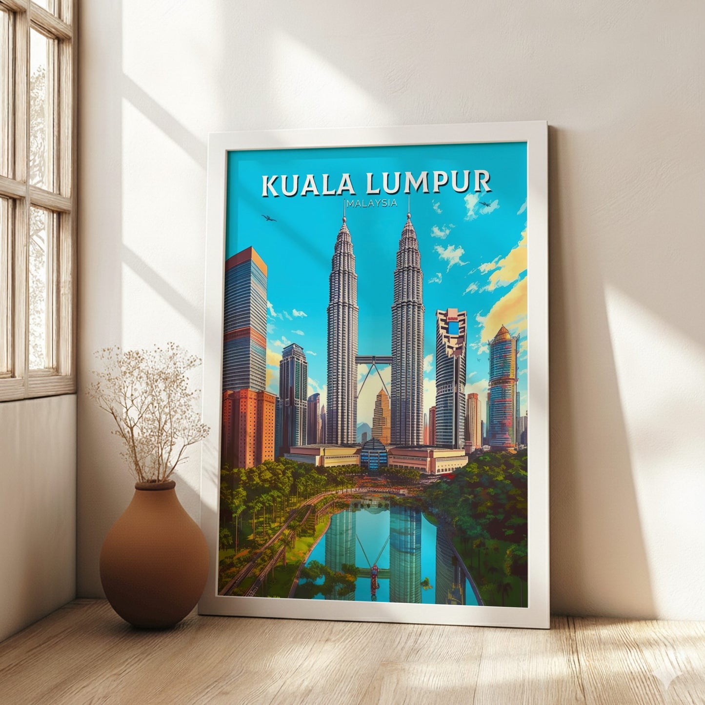 Framed poster of Kuala Lumpur with the Petronas Towers in a bright room.