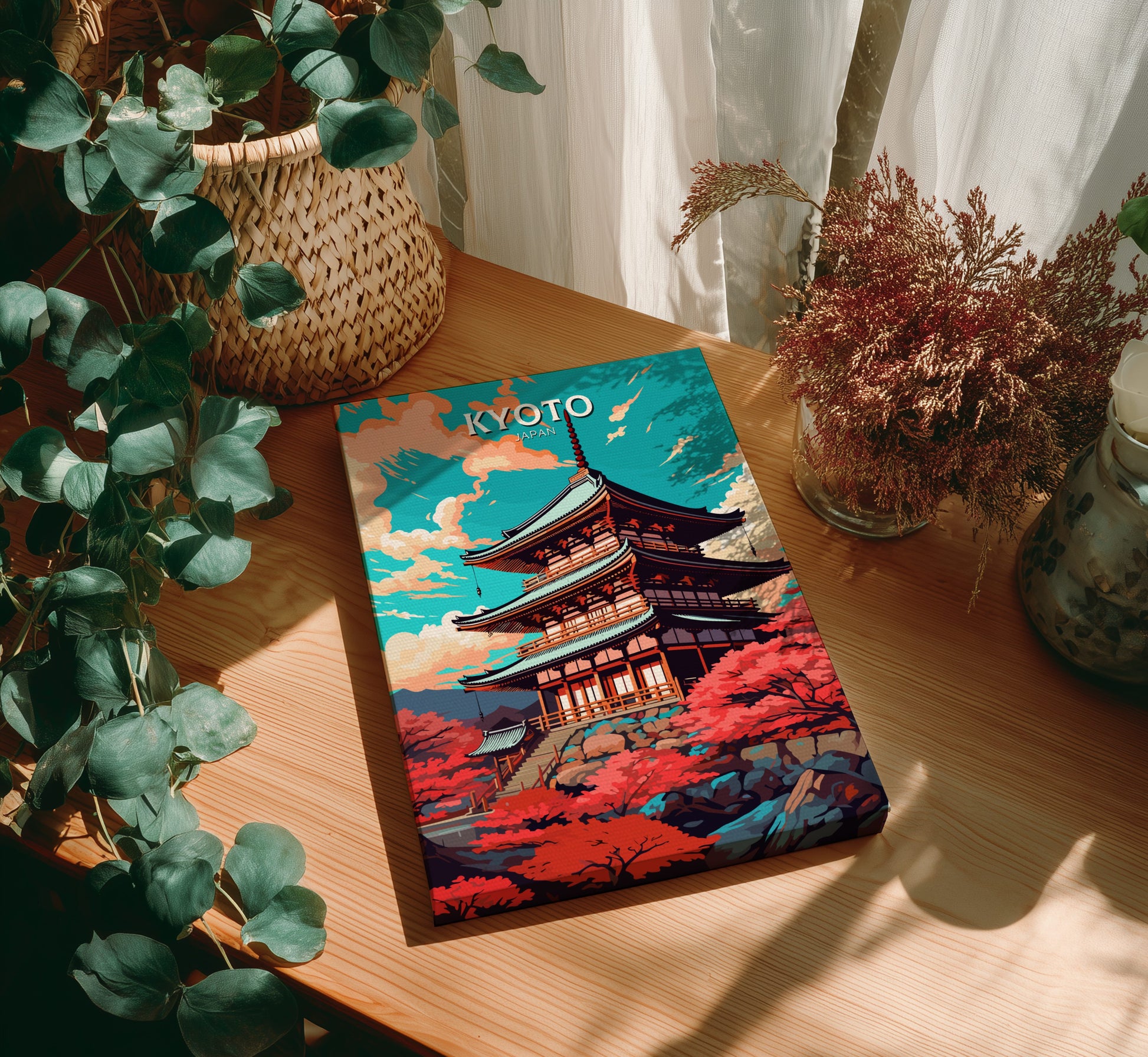 Colorful notebook with Kyoto design on a wooden table with plants