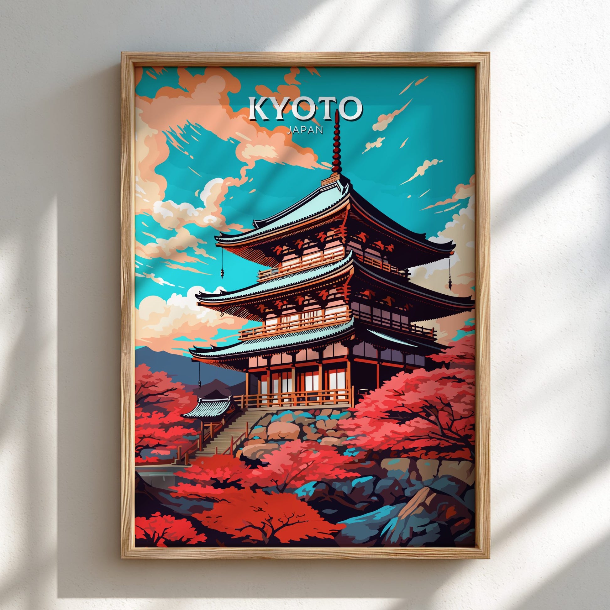 Framed artwork of a traditional Japanese temple with 'Kyoto' text on a blue sky background.