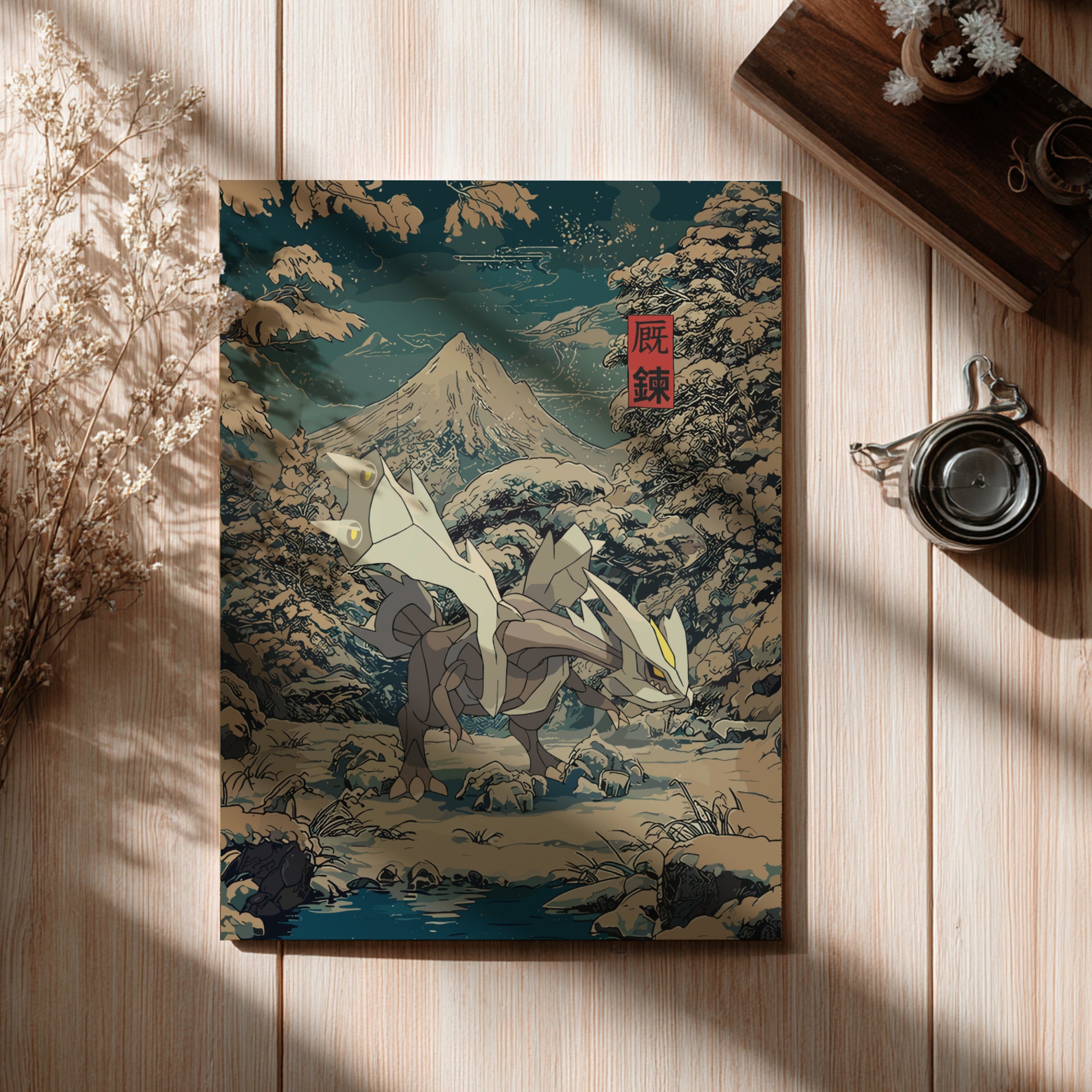 Poster with Kyurem Pokemon illustration on a wooden surface with a cup and branches.