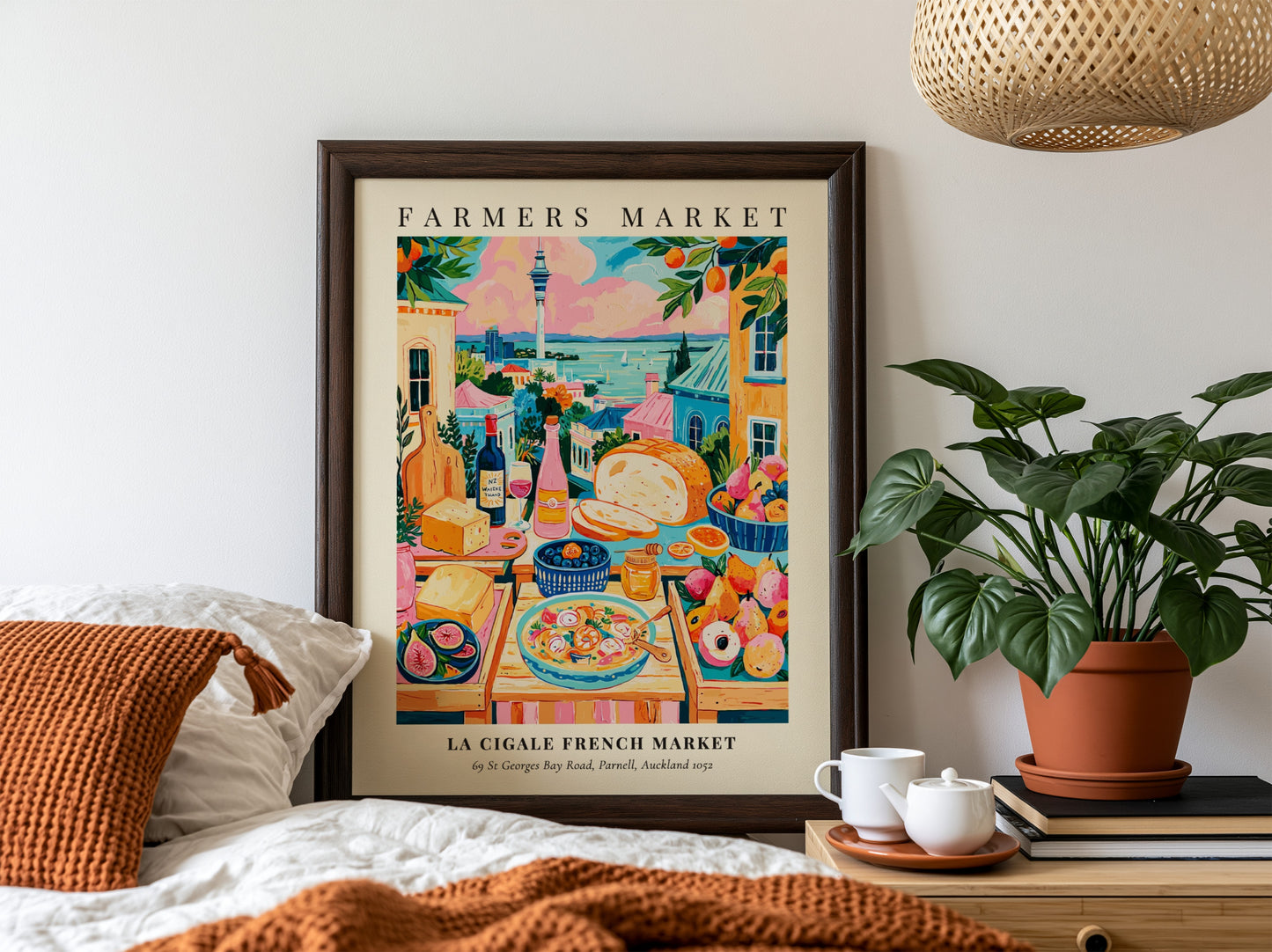 Farmers market poster featuring colorful produce and scenic view of La Cigale French Market in Auckland