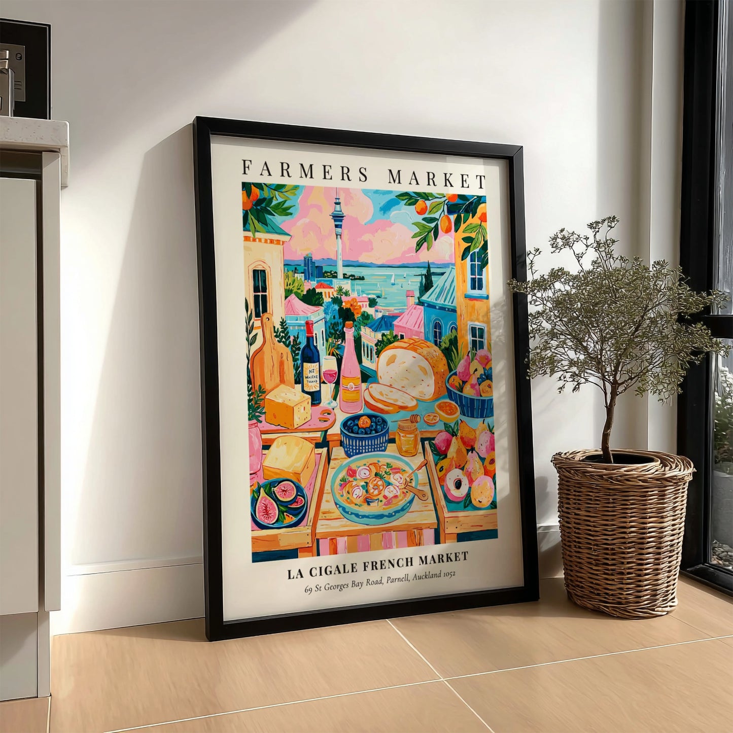 Farmers market poster featuring colorful produce and scenic view of La Cigale French Market in Auckland