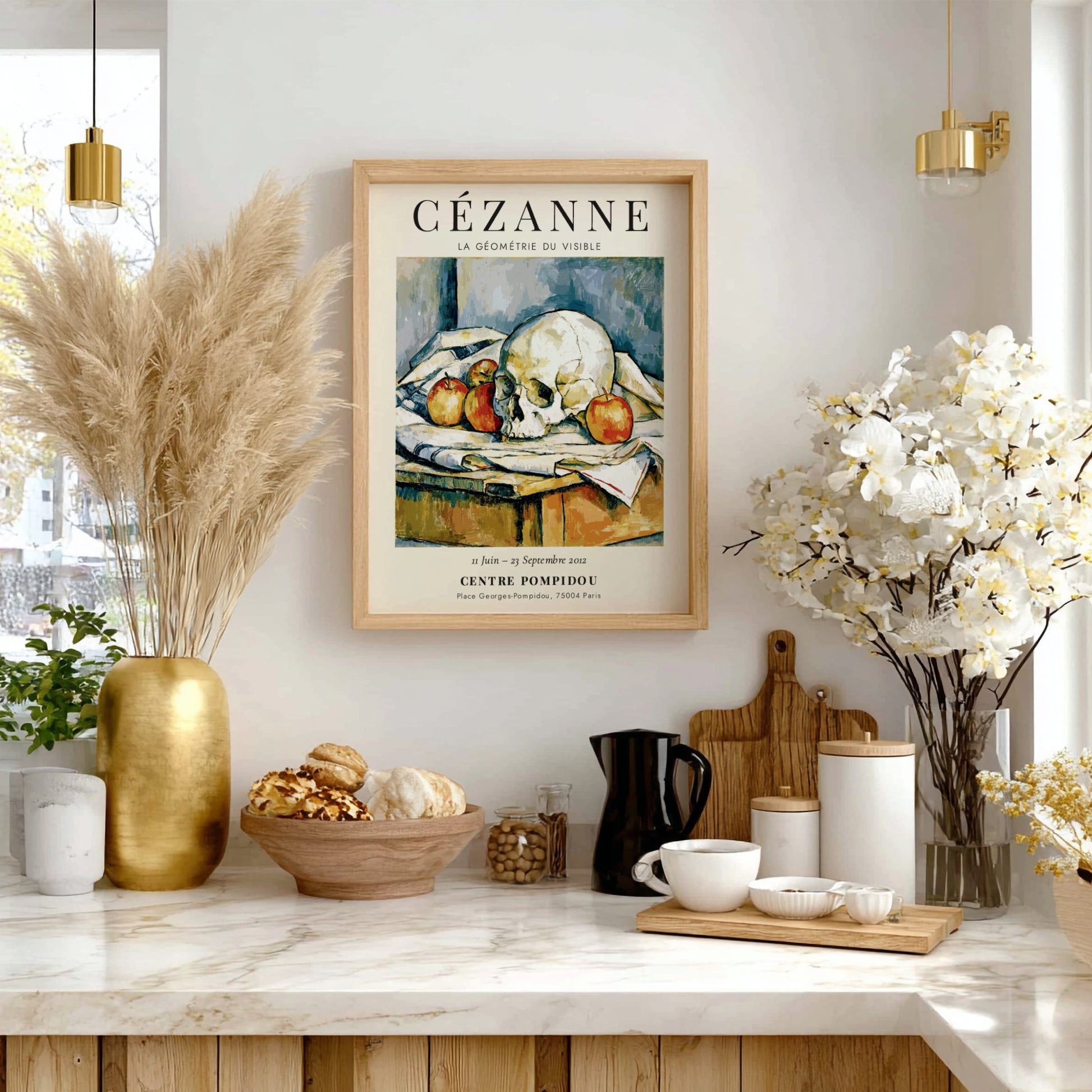 Cézanne Exhibition Posters featuring La Géométrie du Visible, showcasing a skull and apples in earthy tones