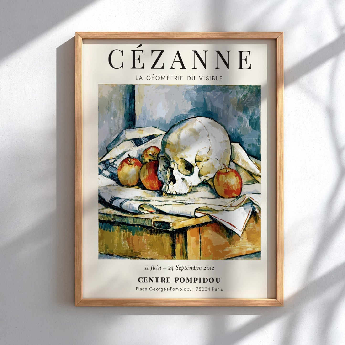 Cézanne Exhibition Posters featuring La Géométrie du Visible, showcasing a skull and apples in earthy tones