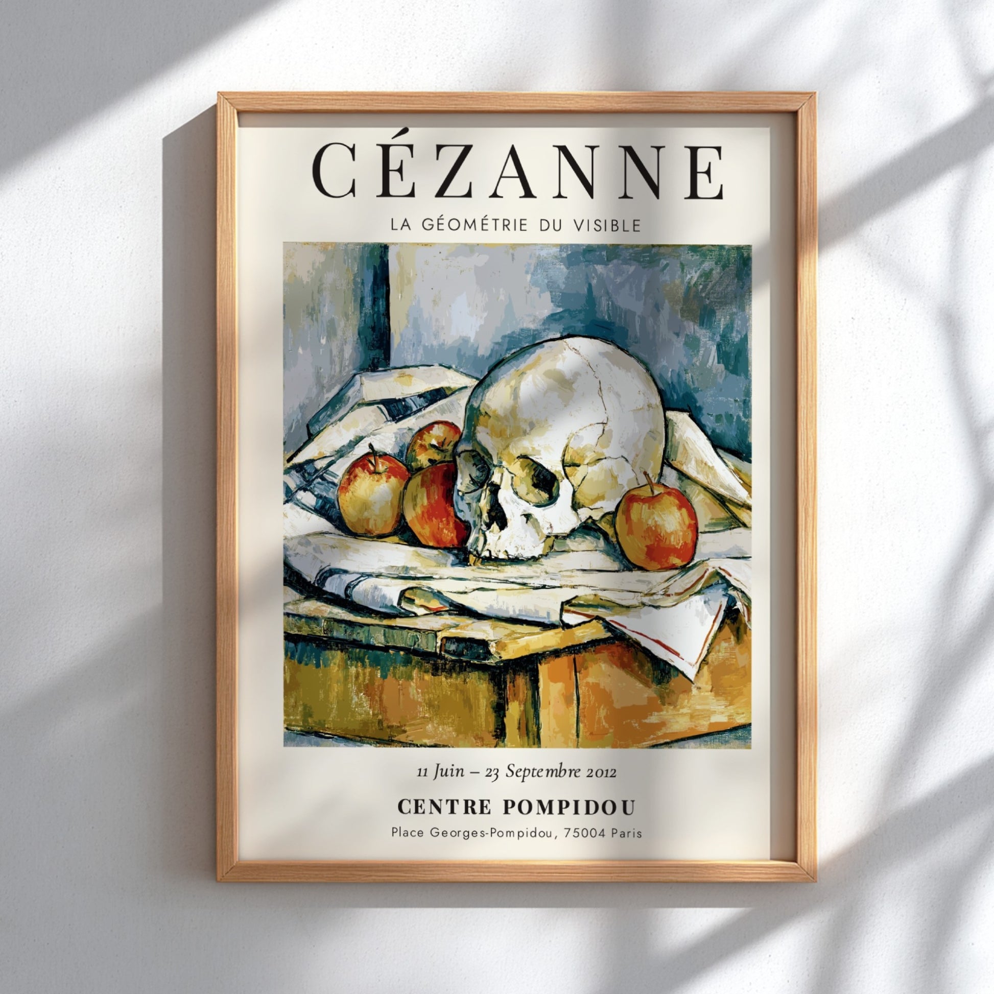 Cézanne Exhibition Posters featuring La Géométrie du Visible, showcasing a skull and apples in earthy tones
