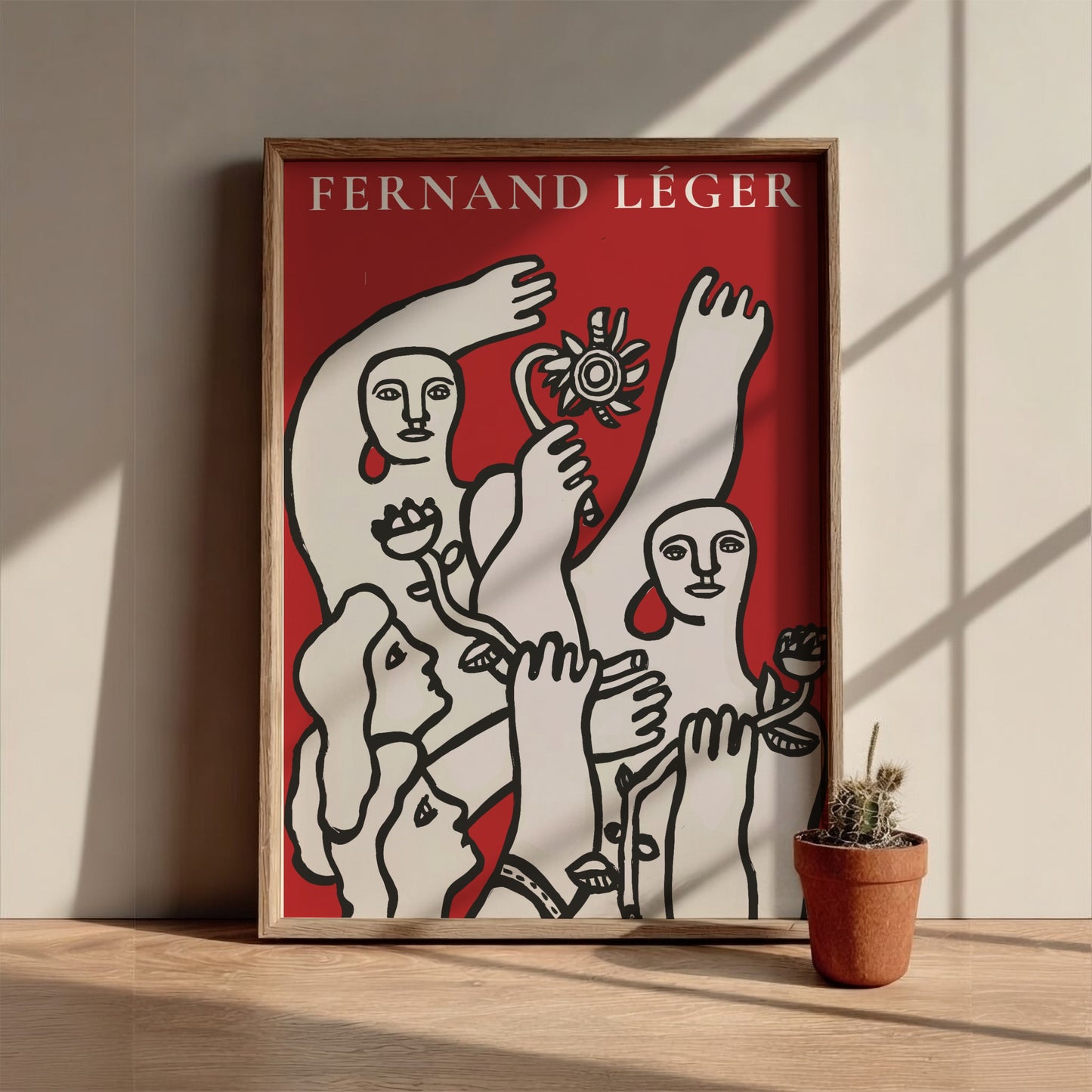 Fernand Léger La Joie de vivre art poster with modernist figures in black and white on red.