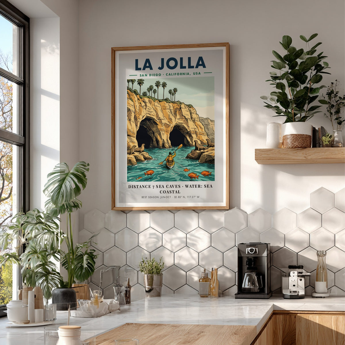 Poster of La Jolla coastline featuring sea caves, a kayaker, and sea lions.
