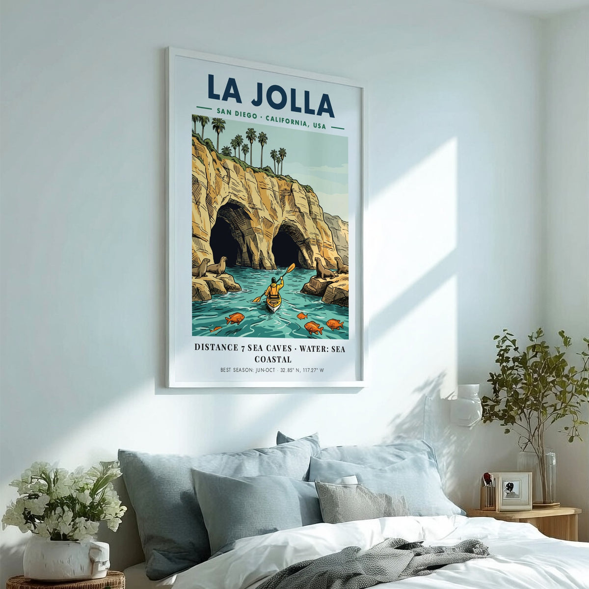 Poster of La Jolla coastline featuring sea caves, a kayaker, and sea lions.