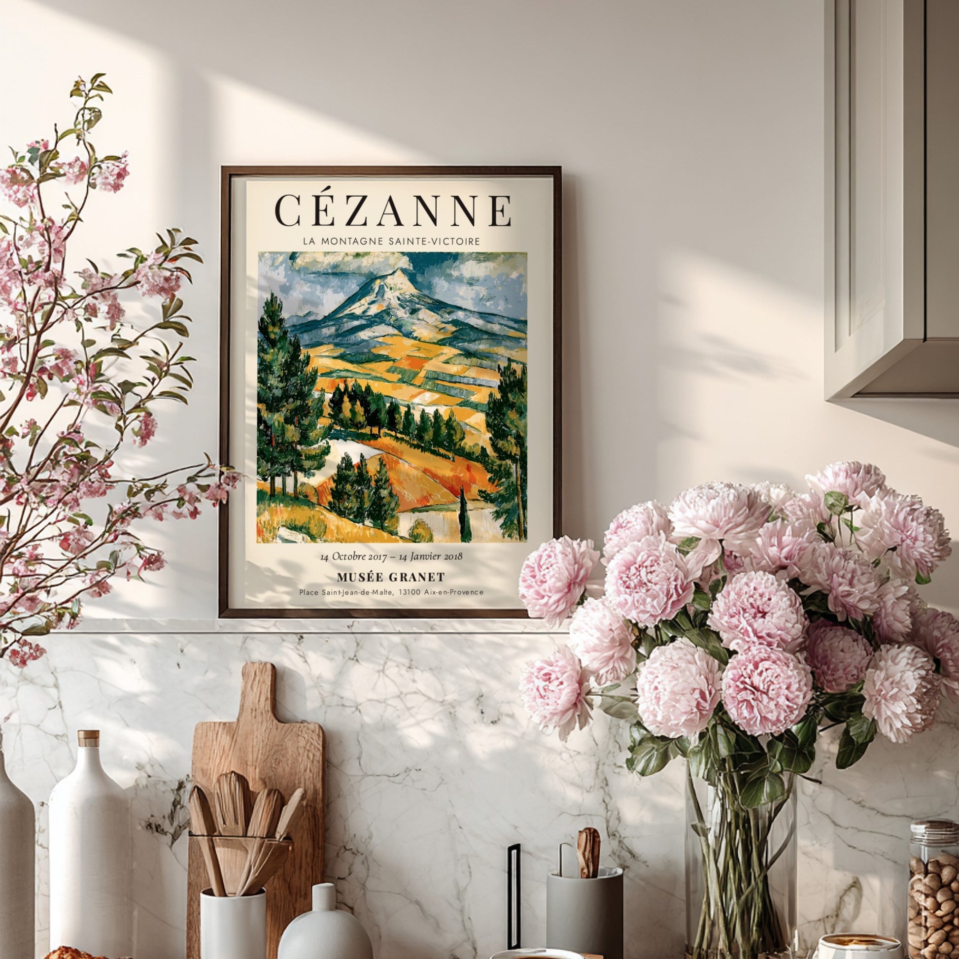 Cézanne exhibition poster featuring La Montagne Sainte-Victoire with vibrant colors and expressive