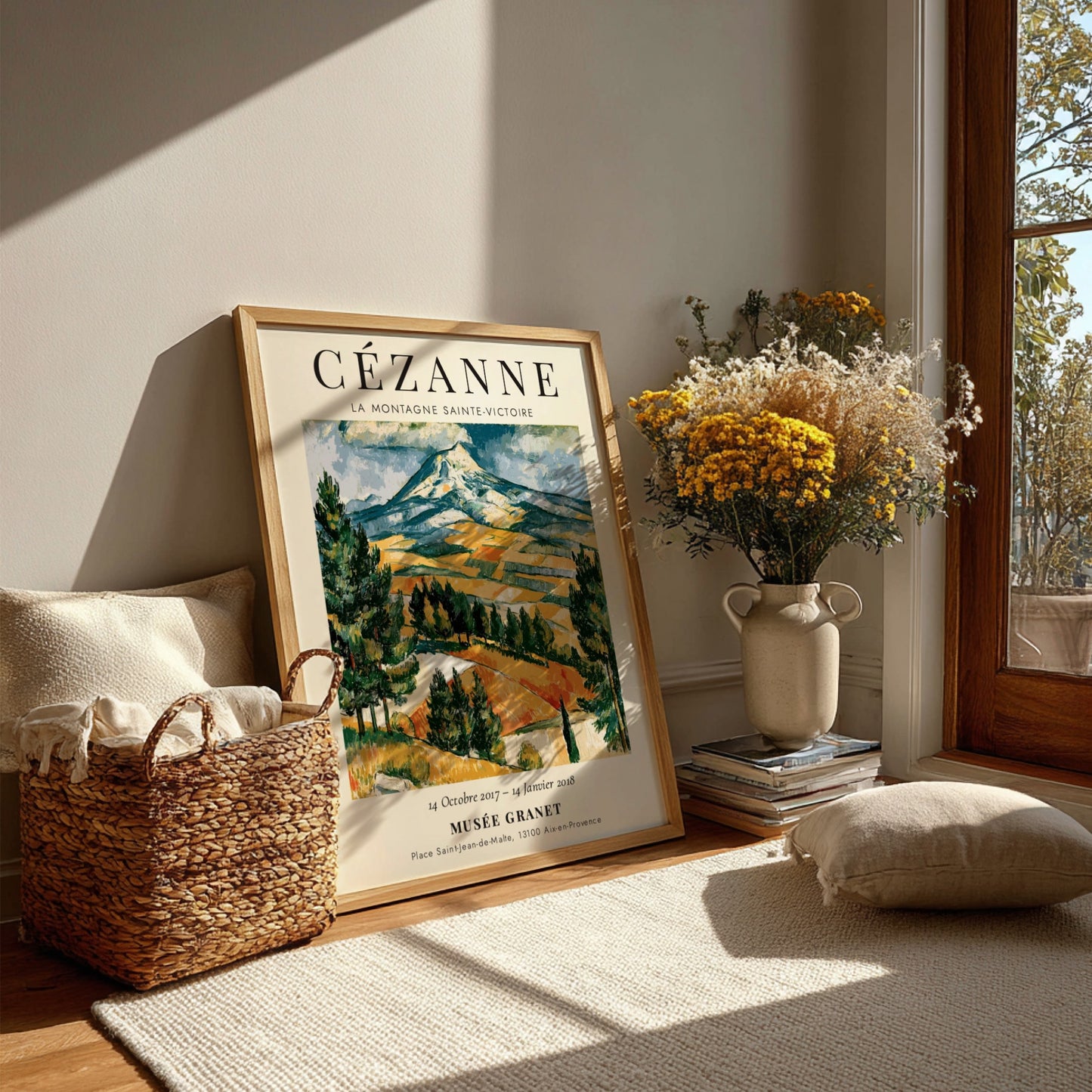 Cézanne exhibition poster featuring La Montagne Sainte-Victoire with vibrant colors and expressive