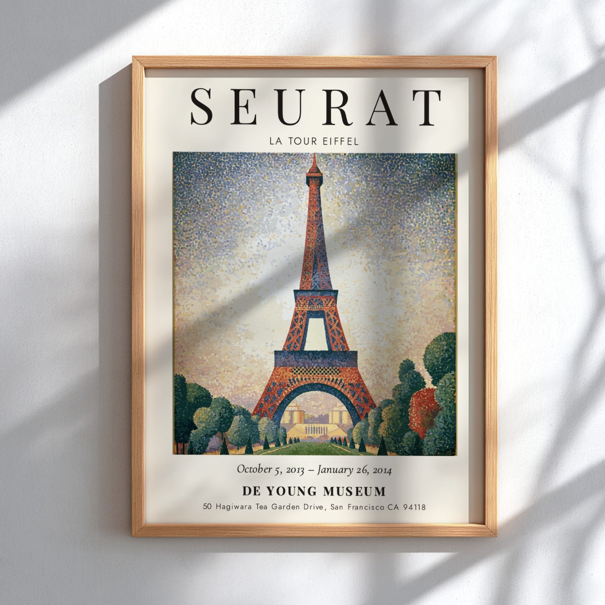 Seurat Exhibition Poster featuring La Tour Eiffel in vibrant pointillist style
