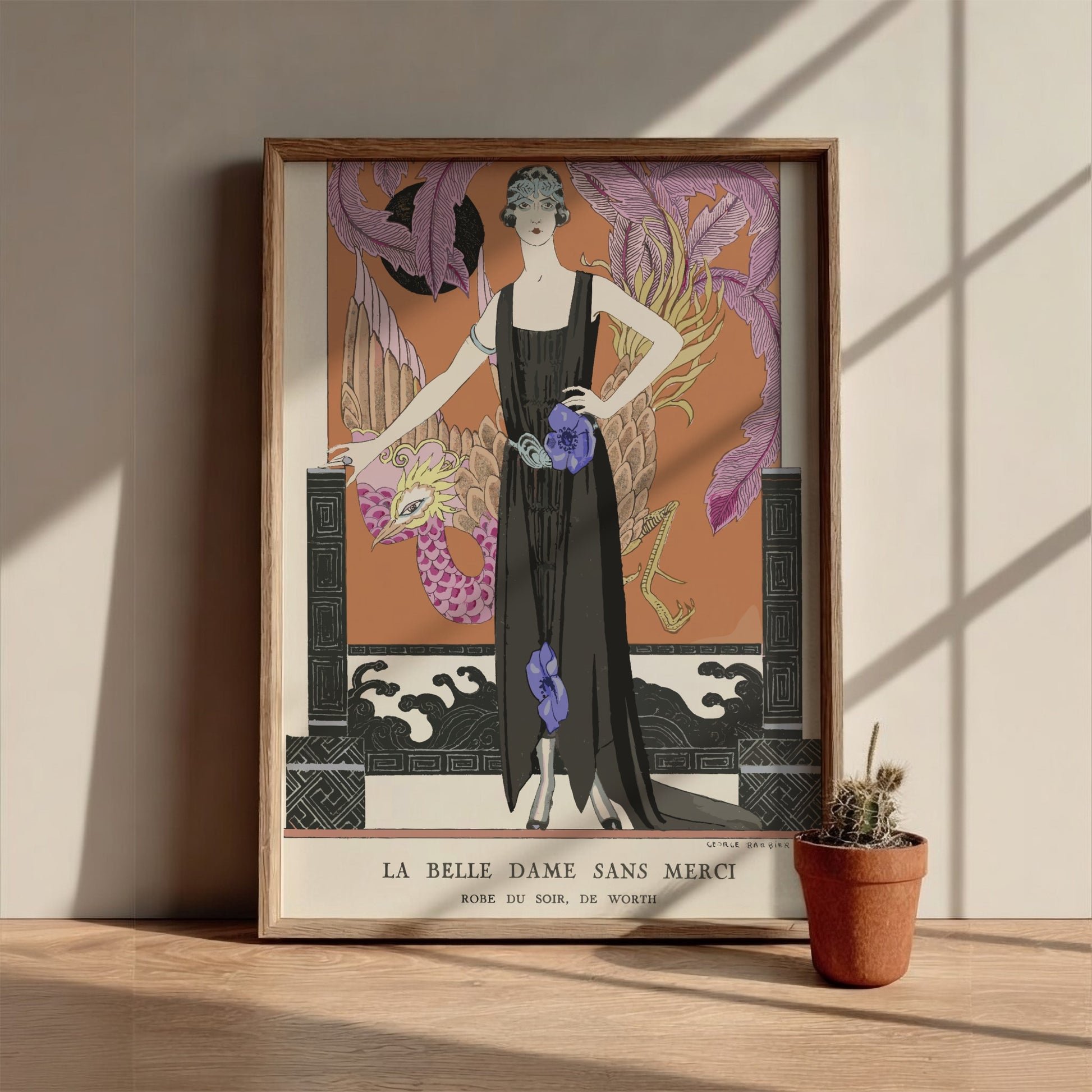Art Nouveau poster of 'La Belle Dame Sans Merci' by George Barbier, featuring a woman in a black gown.