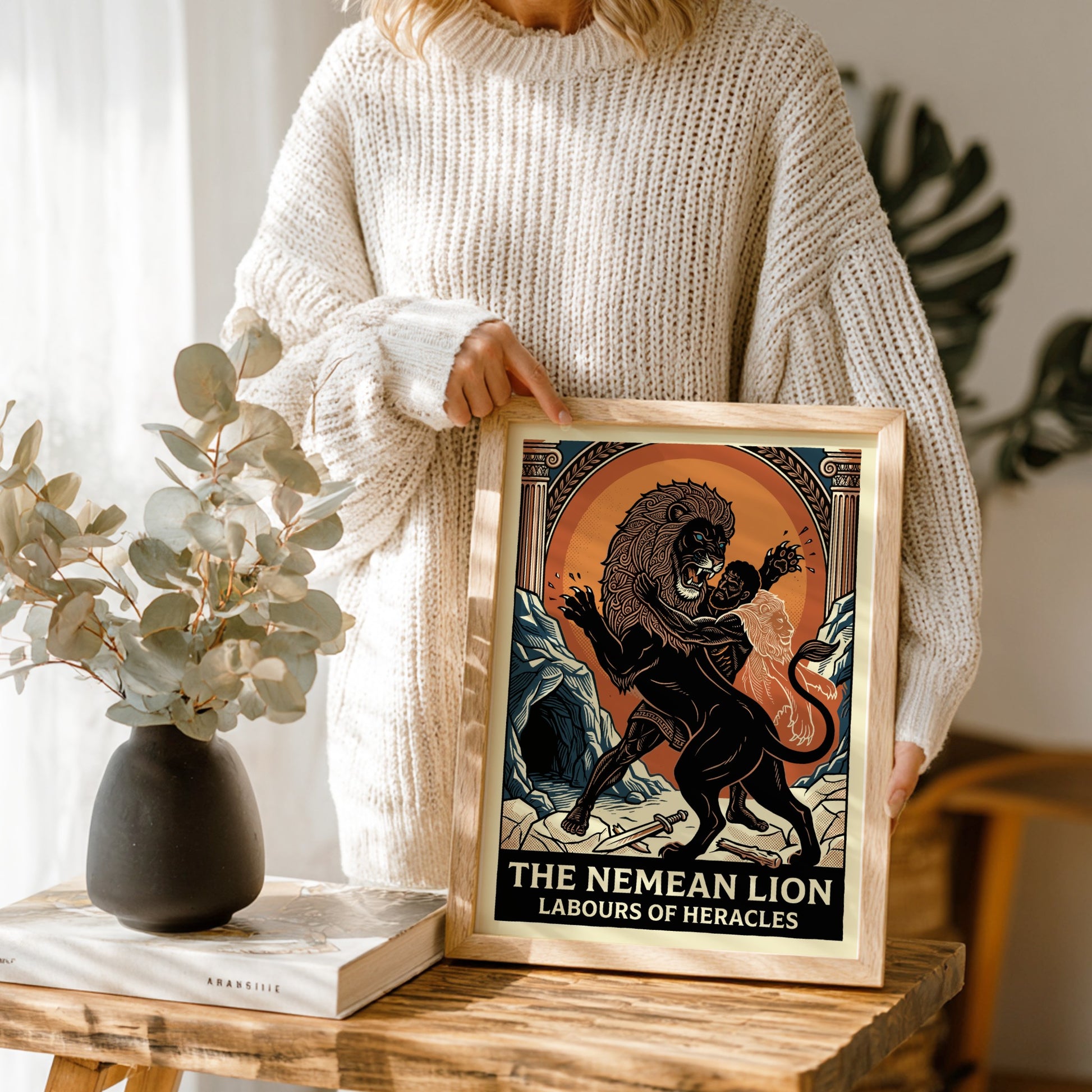 Nemean Lion poster featuring Heracles wrestling a lion, in a bold graphic style with an orange sun.