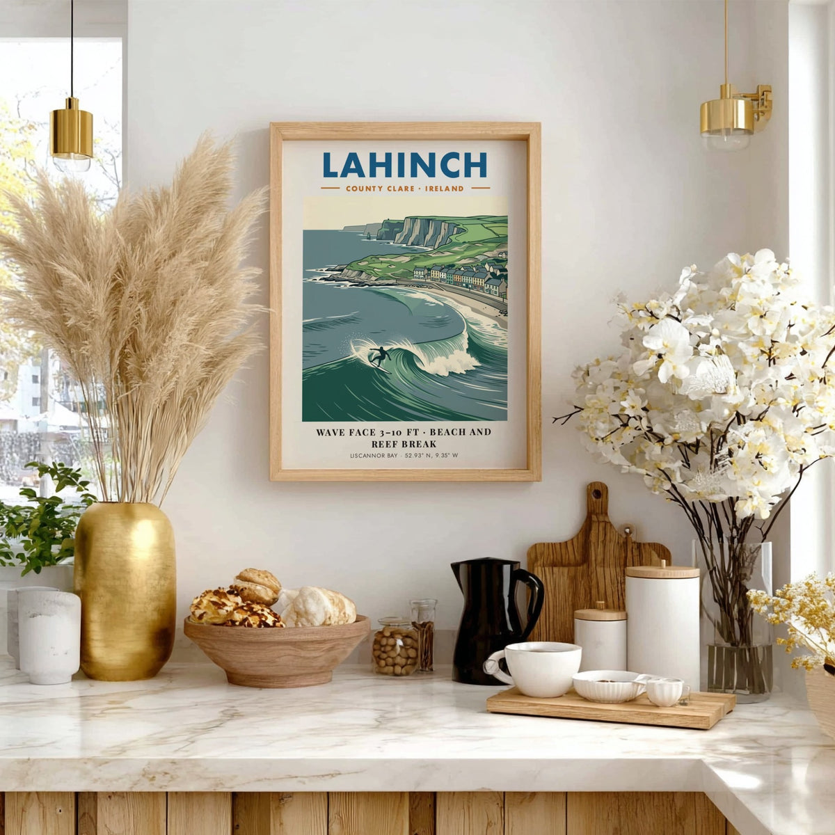 Poster of Lahinch with a surfer on a wave near cliffs and houses.