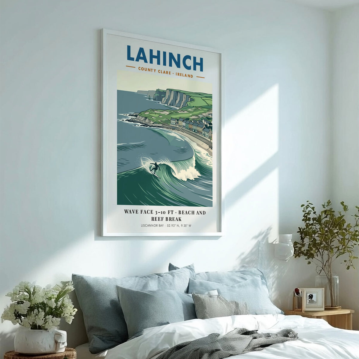 Poster of Lahinch with a surfer on a wave near cliffs and houses.
