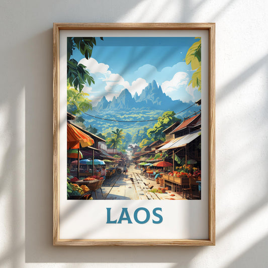 Framed artwork of a Laos street scene with mountains in the background