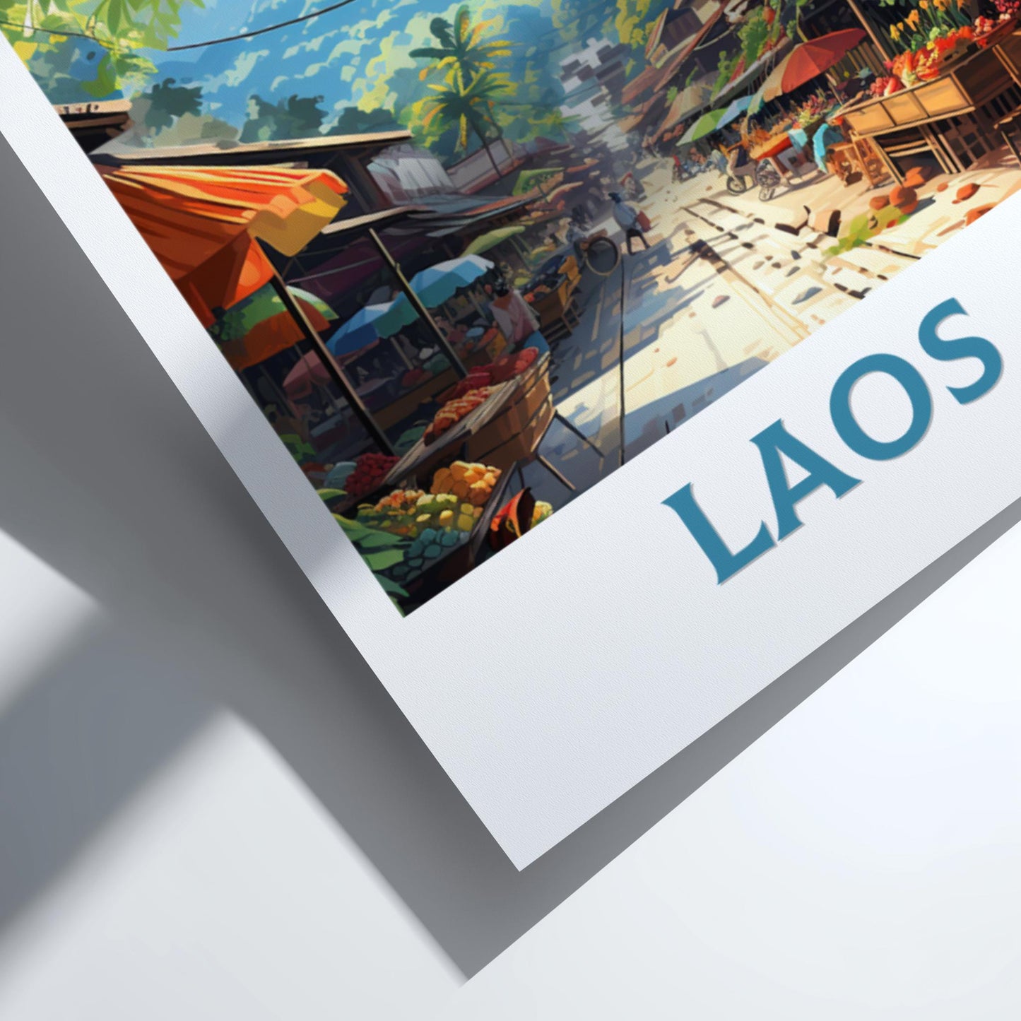 Framed artwork of a street scene with 'LAOS' text