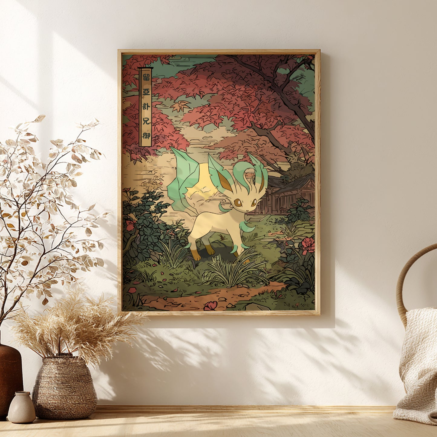 Framed artwork of Leafeon Pokemon in a natural setting on a wall.