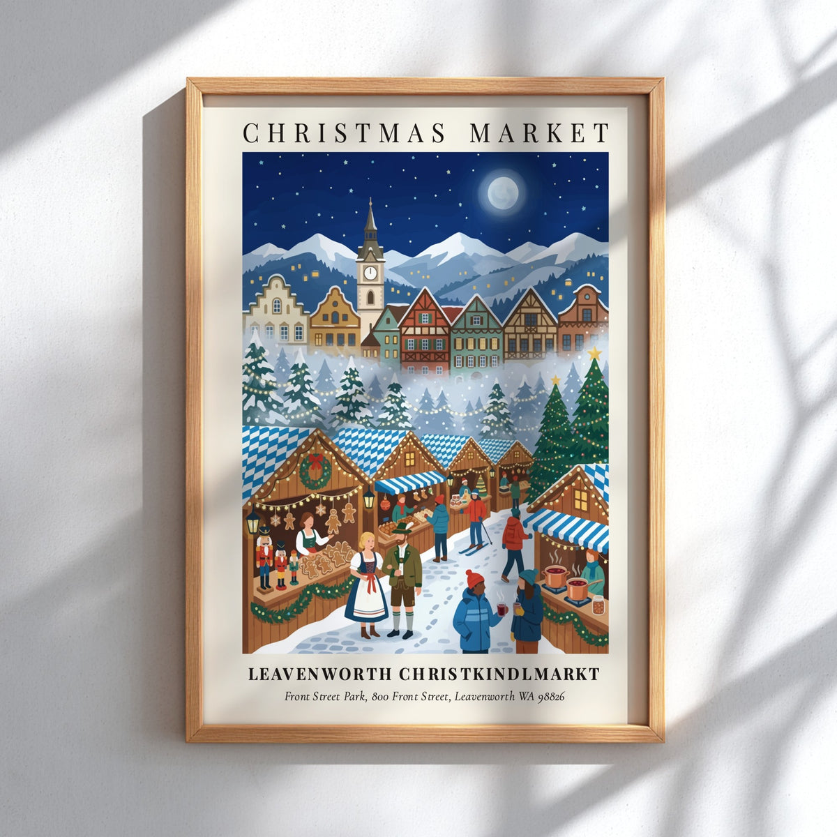Poster of a festive Leavenworth Christkindlmarkt scene with timber buildings, snow-covered mountains, and