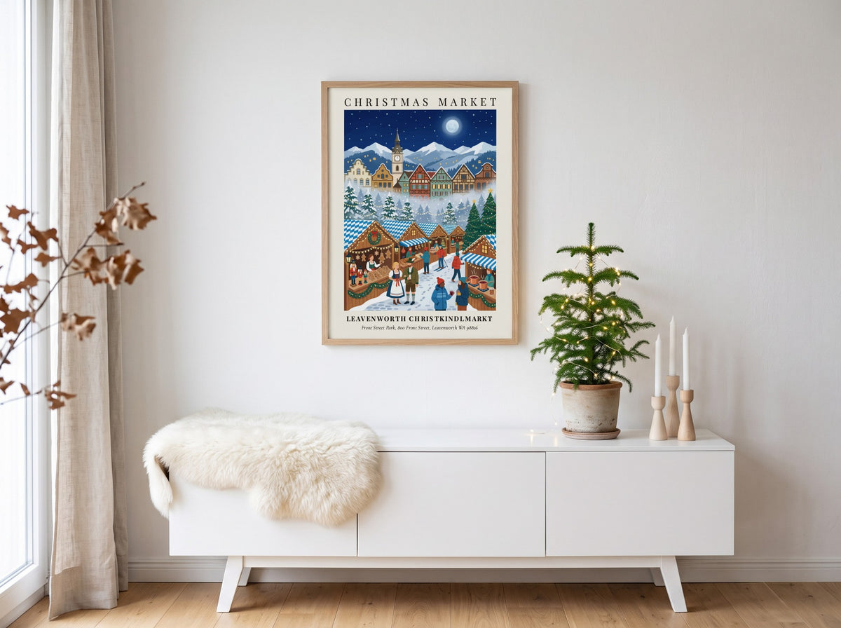Poster of a festive Leavenworth Christkindlmarkt scene with timber buildings, snow-covered mountains, and