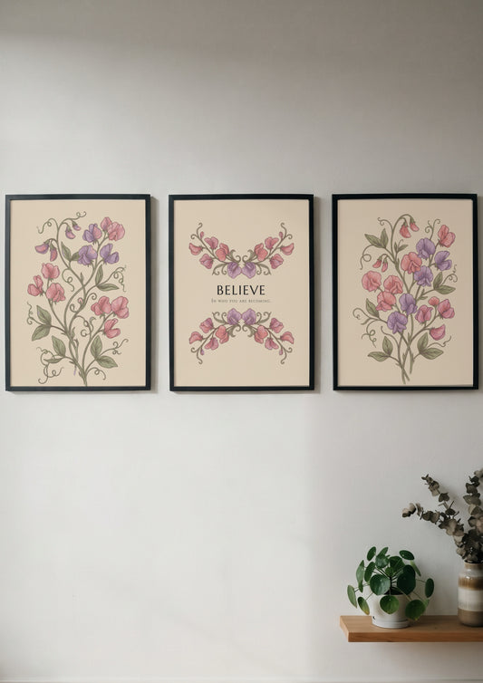 Poster triptych featuring sweet pea flowers and the word believe on a cream background.