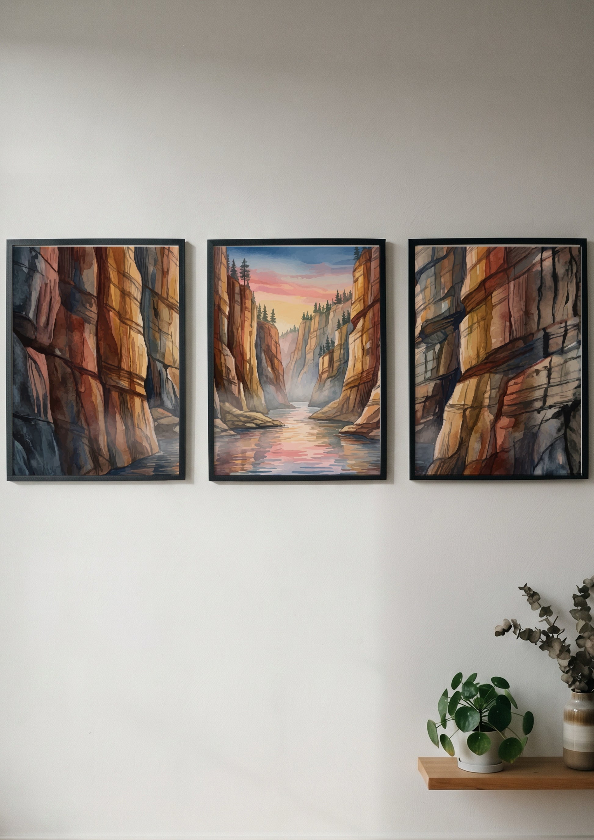 Three vertical watercolour panels depicting a canyon river landscape under a sunset sky