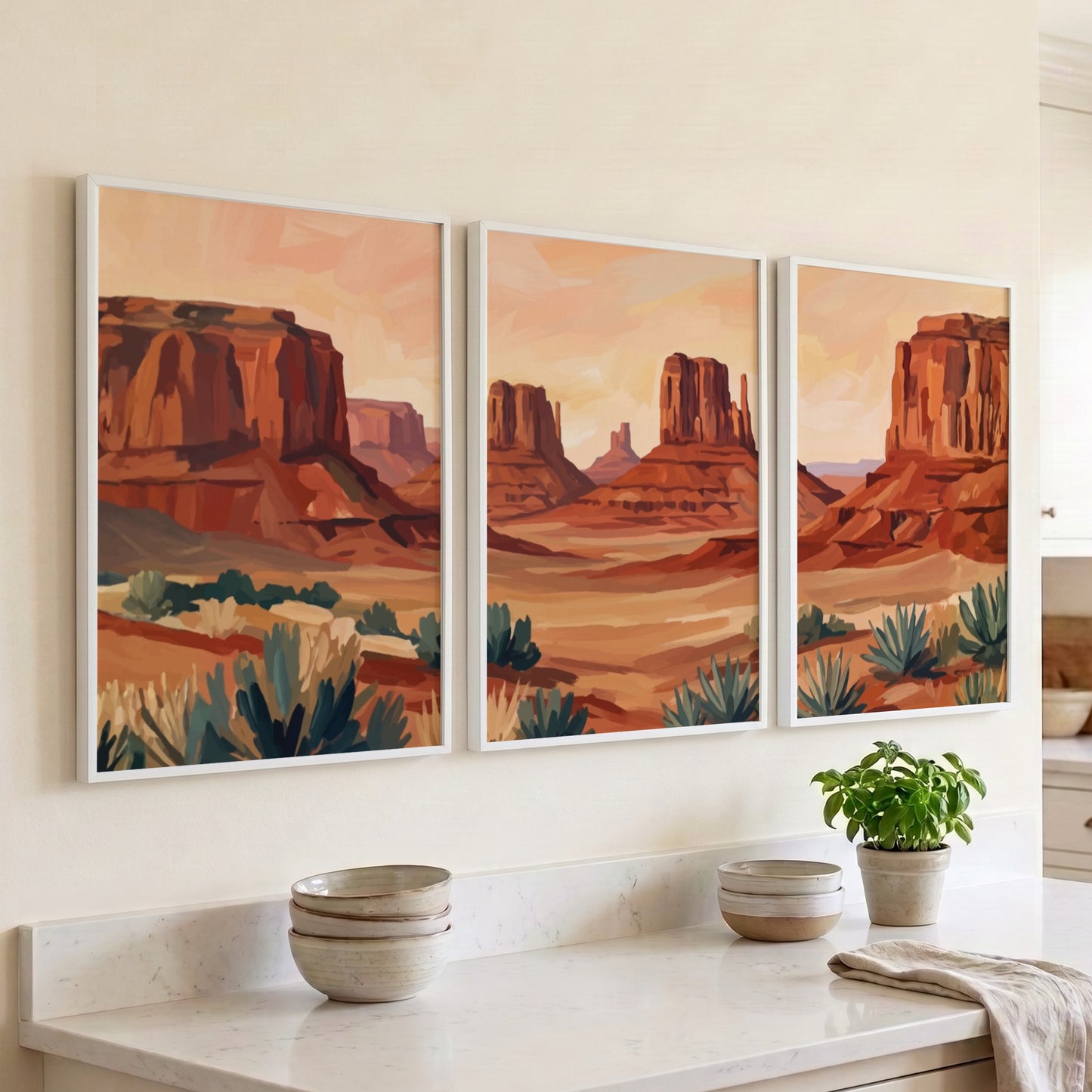 Triptych of desert rock formations featuring warm ochre and sage tones in landscape
